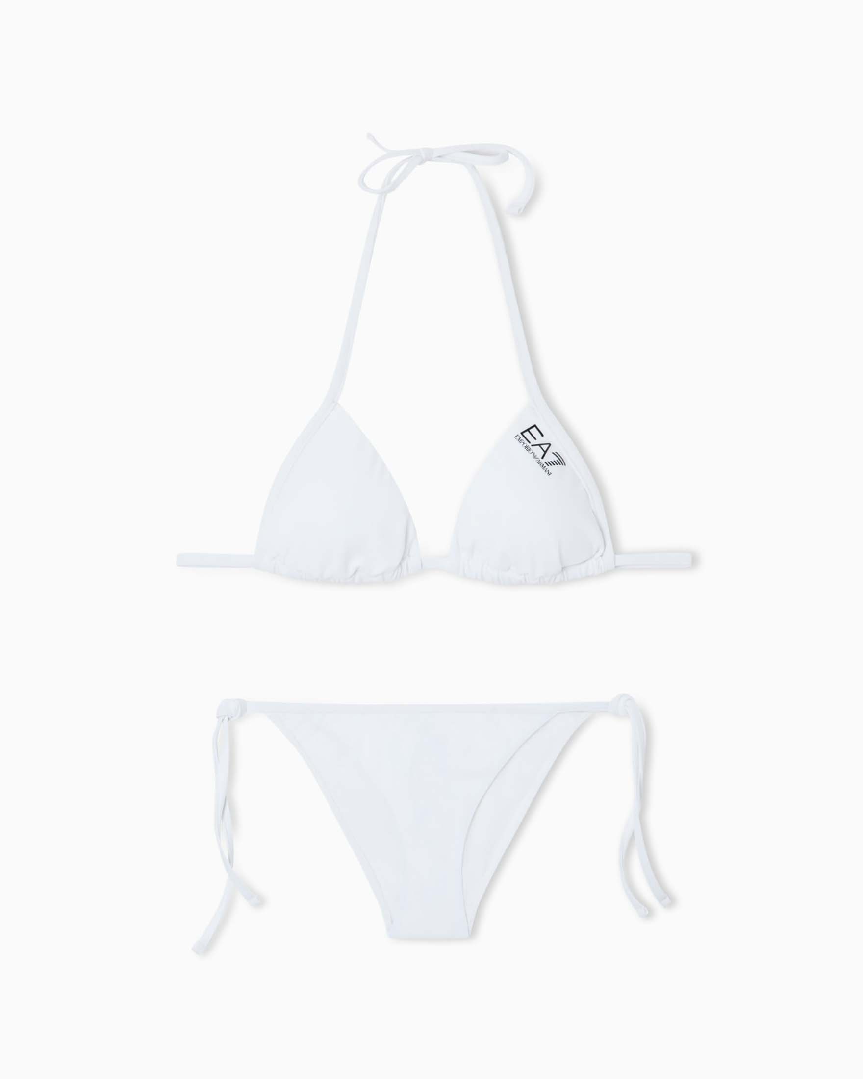 Bikini bianco con reggiseno a triangolo e slip con laccetti regolabili