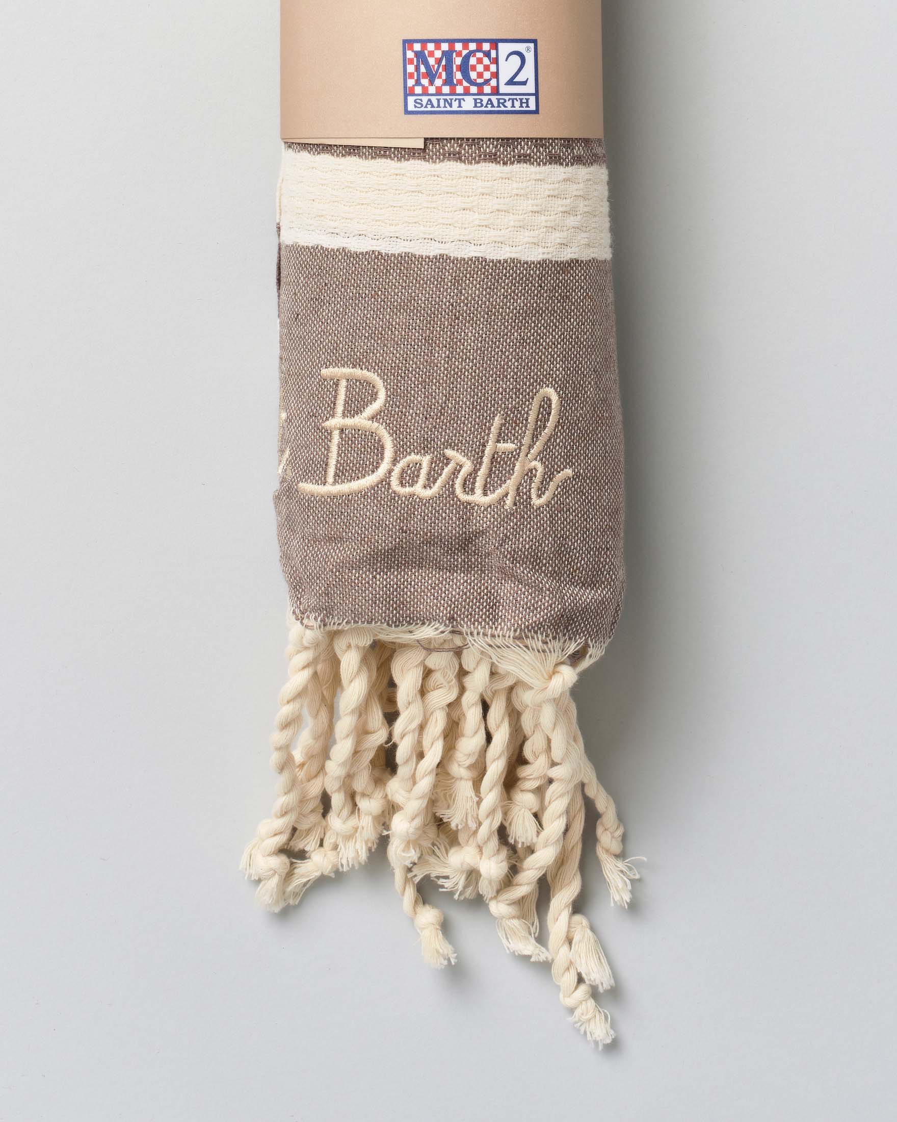 Telo mare MC2 Saint Barth marroncino in cotone a righe beige con frange e scritta logo ricamata image