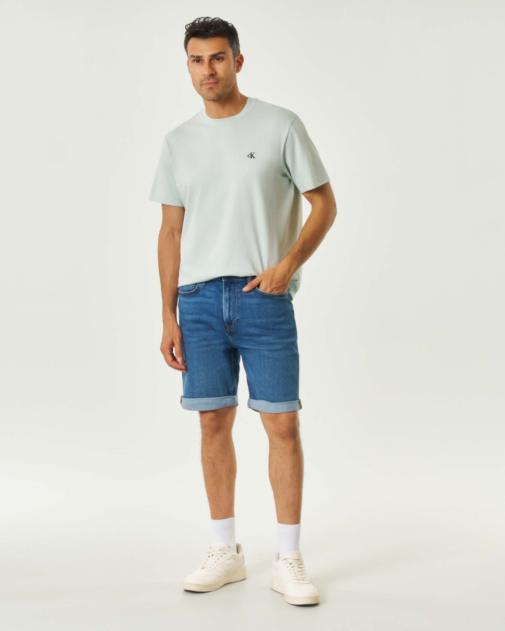 Bermuda Jeans lavaggio medio stone washed in cotone stretch con risvolto