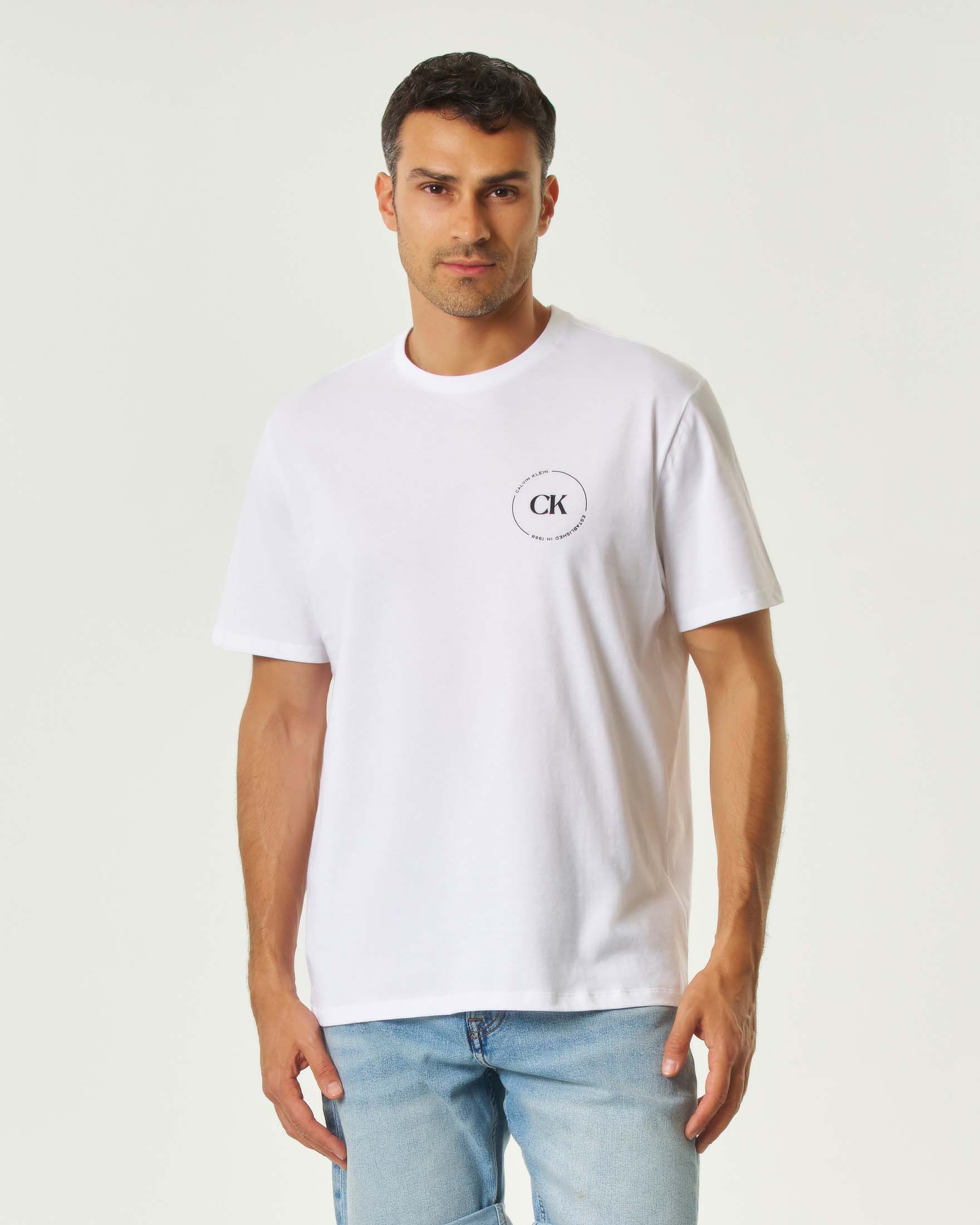 T-shirt bianca mezza manica Calvin Klein Jeans con logo bollo stampato fronte e retro