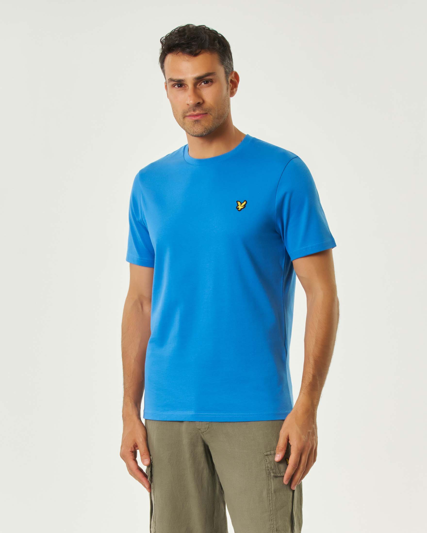 T-shirt mezza manica celeste in cotone con logo aquila gialla ricamata sul petto