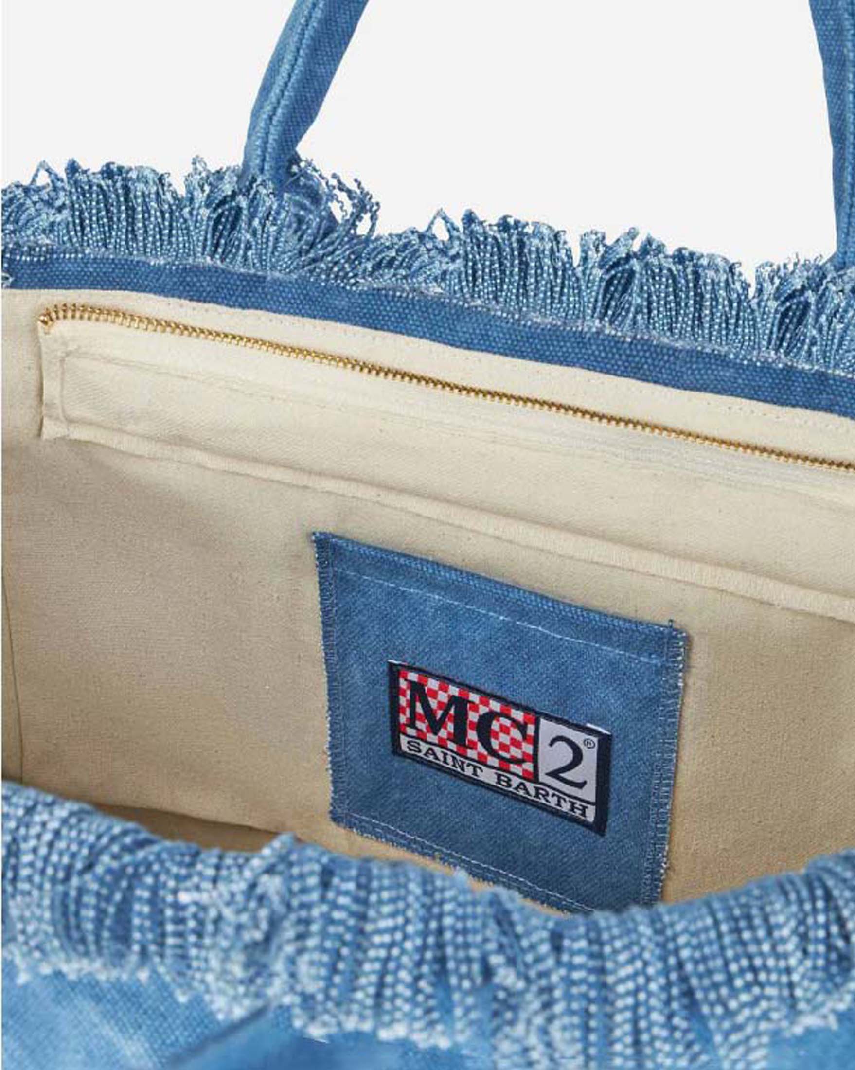 Borsa Vanity Regular MC2 Saint Barth in denim di cotone blu con scritto logo patch e frange image