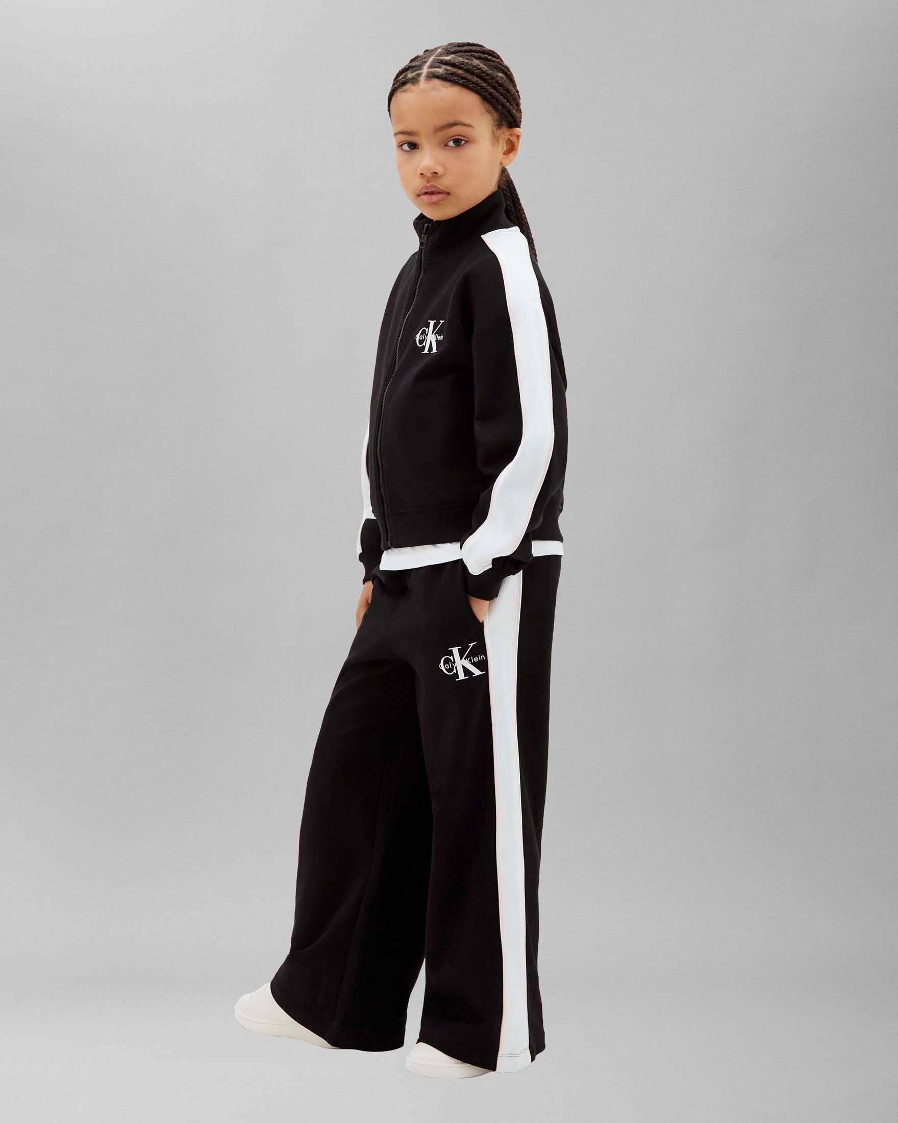 Tuta nera Calvin Klein in misto cotone con bande bianche