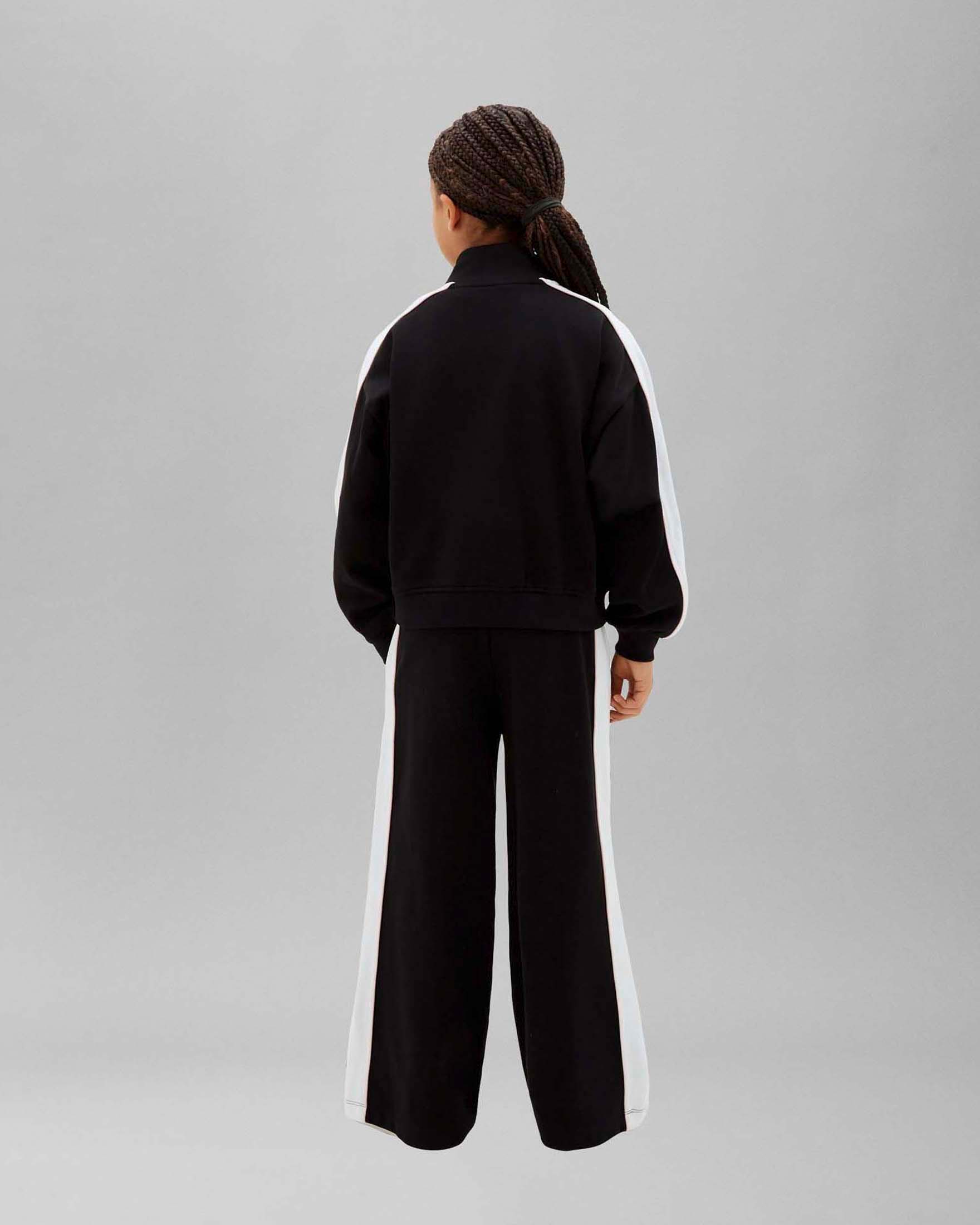 Tuta nera Calvin Klein in misto cotone con bande bianche image