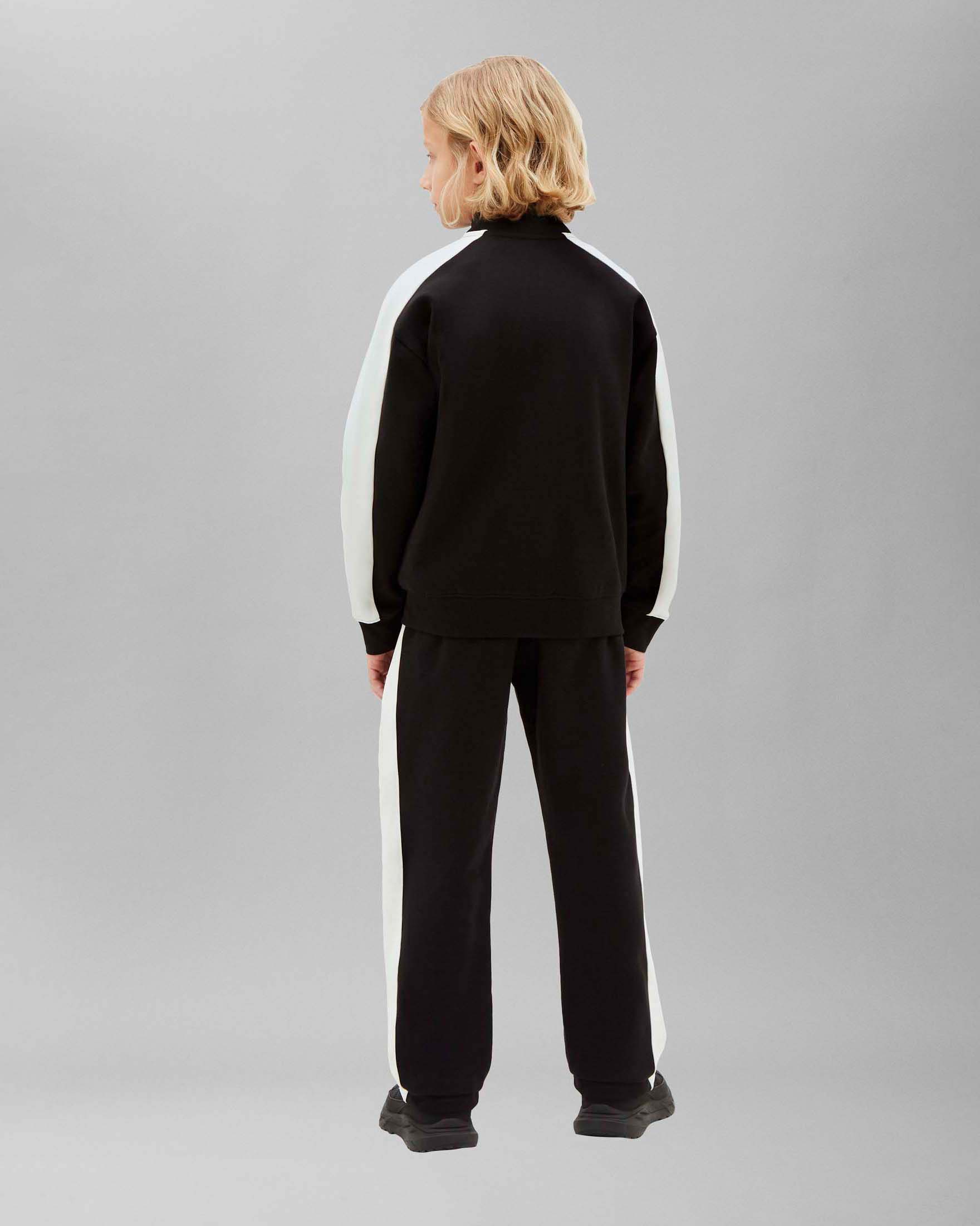 Tuta nera Calvin Klein in misto cotone con bande bianche image