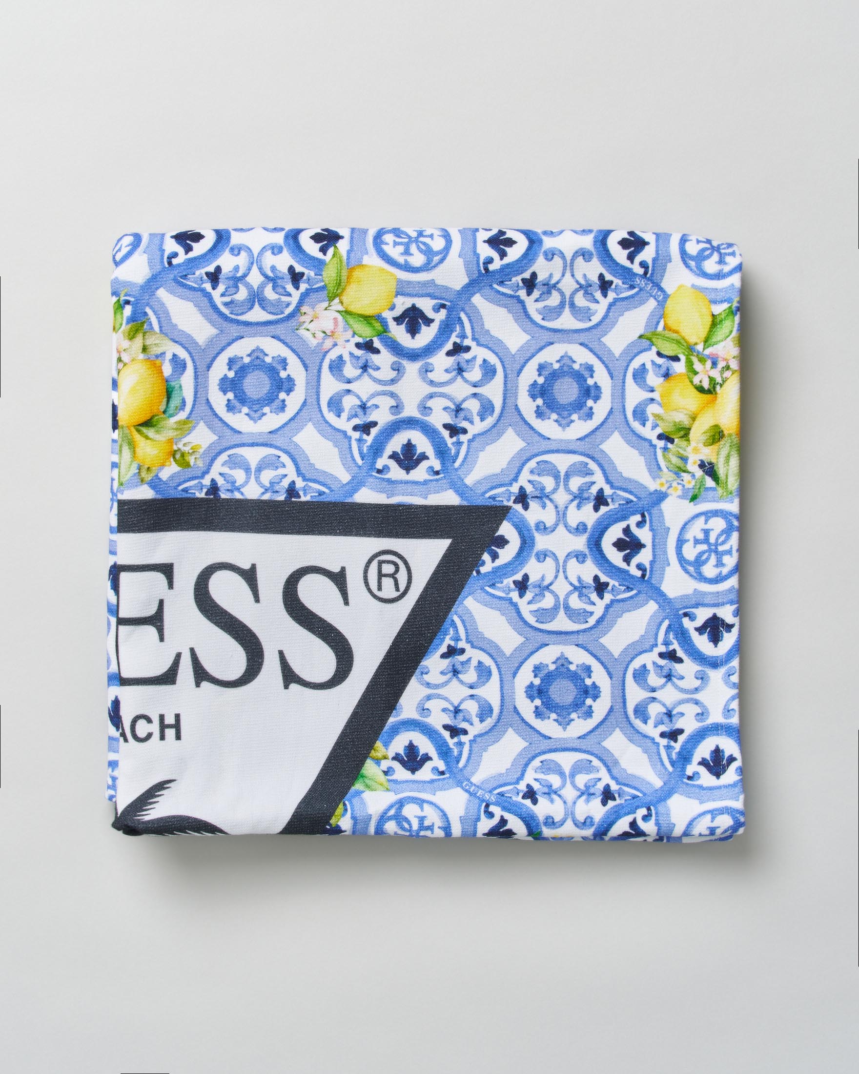 Telo mare blu in cotone con stampa limoni e logo icon
