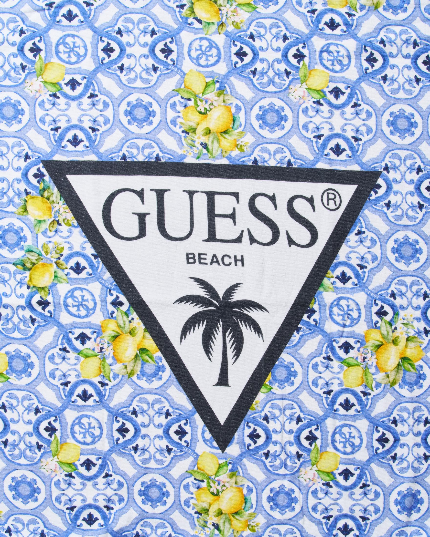 Telo mare Guess blu in cotone con stampa limoni e logo icon image