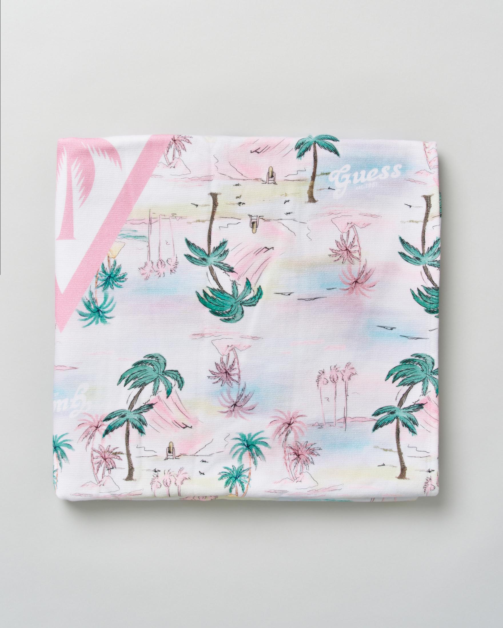 Telo mare con colori pastello in cotone con stampa palme e logo icon