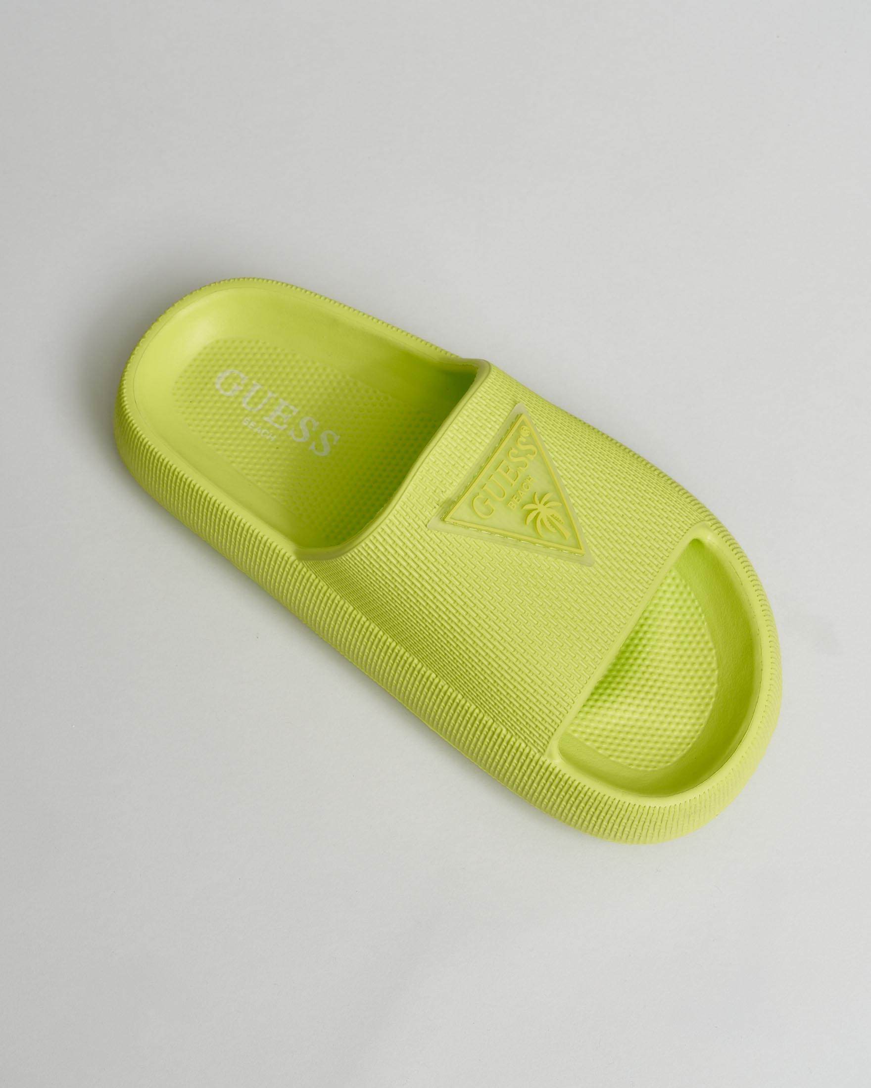 Ciabatte Guess lime in vinile con patch logo a triangolo image
