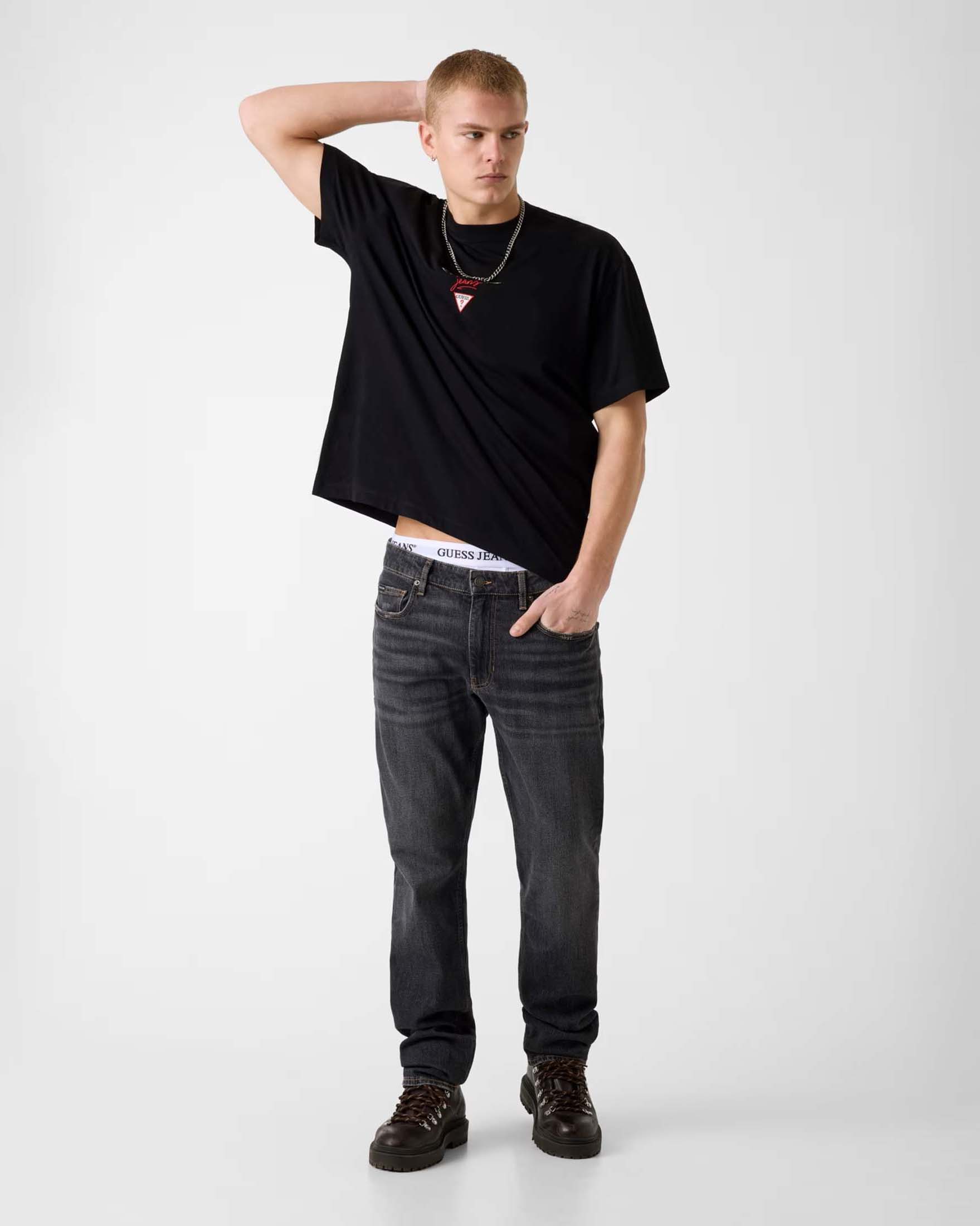 Guess Jeans slim lavaggio nero in cotone elasticizzato con baffature