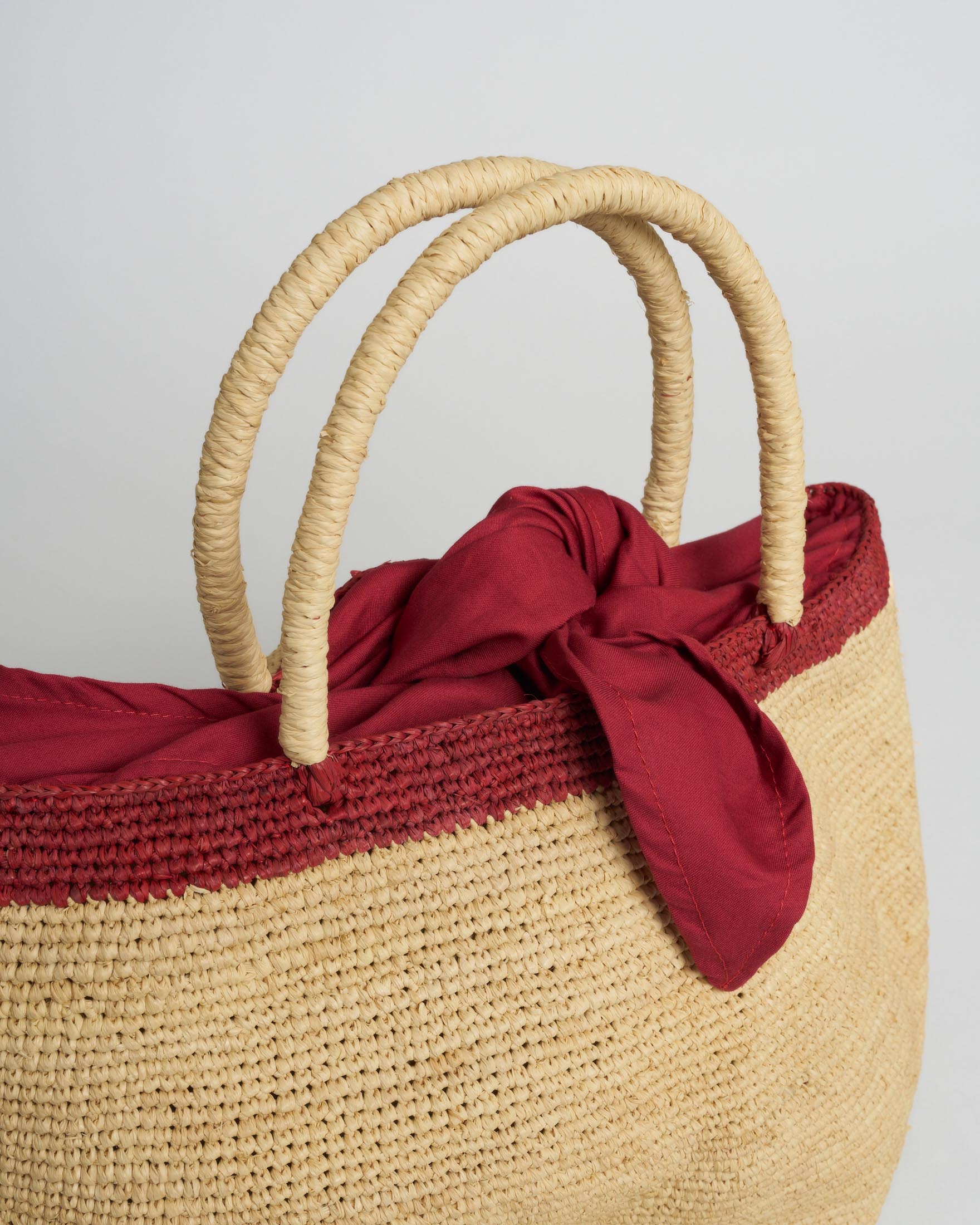 Borsa a secchiello Sovani in rafia naturale con bordo a contrasto rosso image