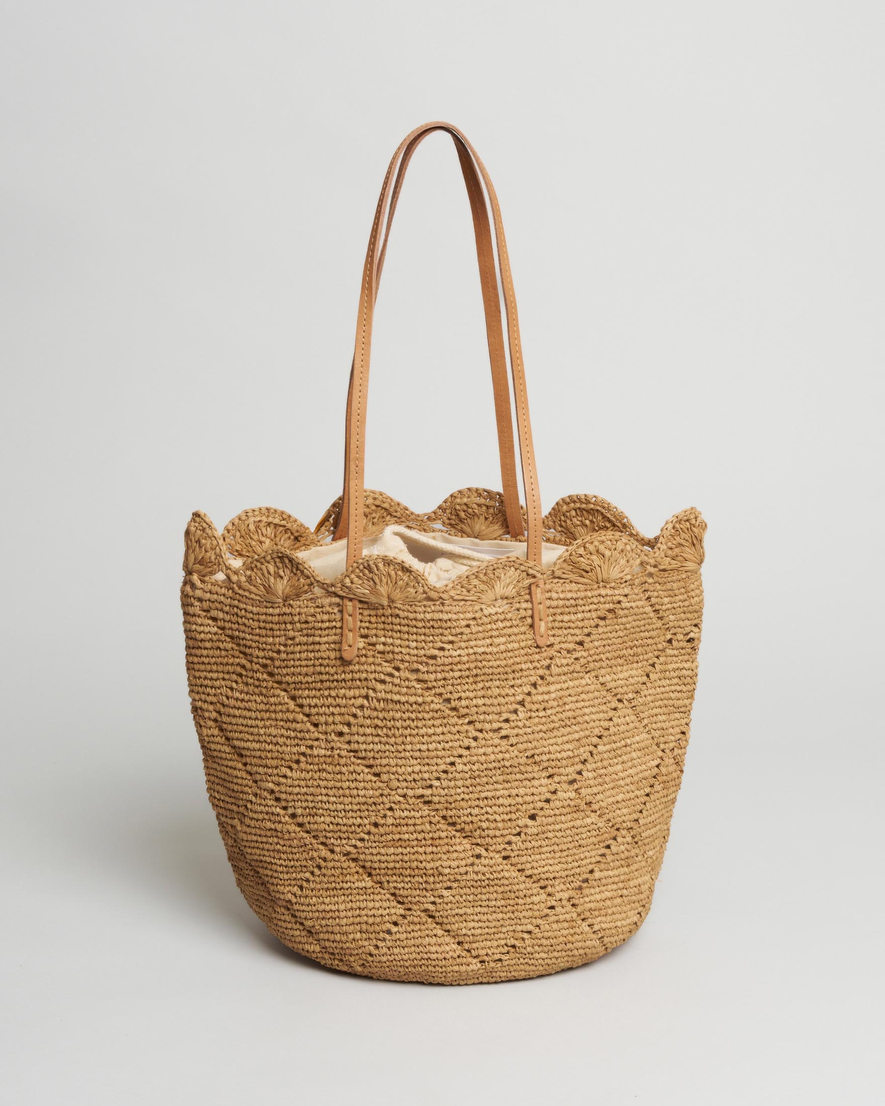 Borsa a secchiello Sovani in rafia naturale con disegni geometrici e chiusura a sacco