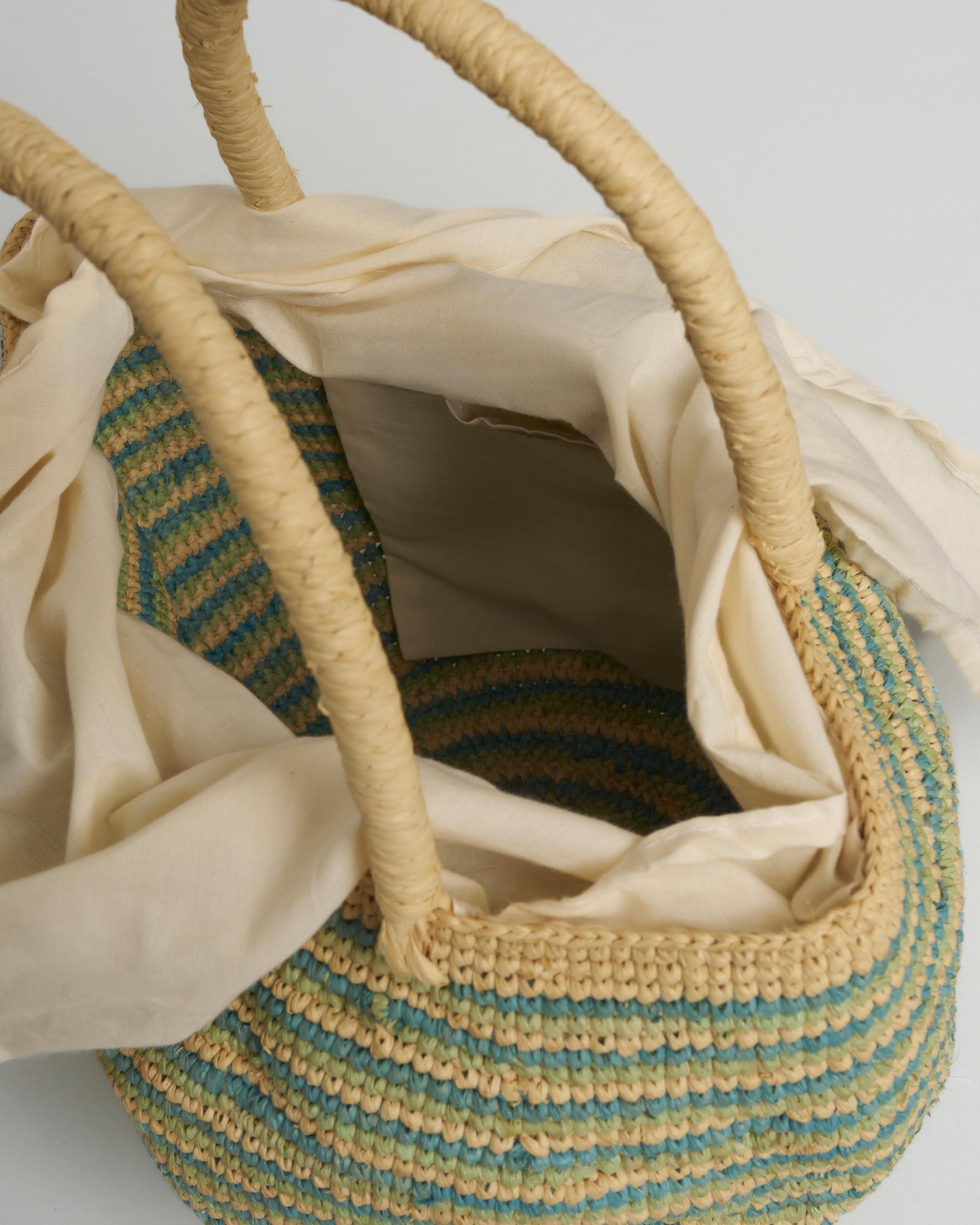 Borsa a secchiello Sovani in rafia a righe color acqua e naturale con chiusura a fiocco image