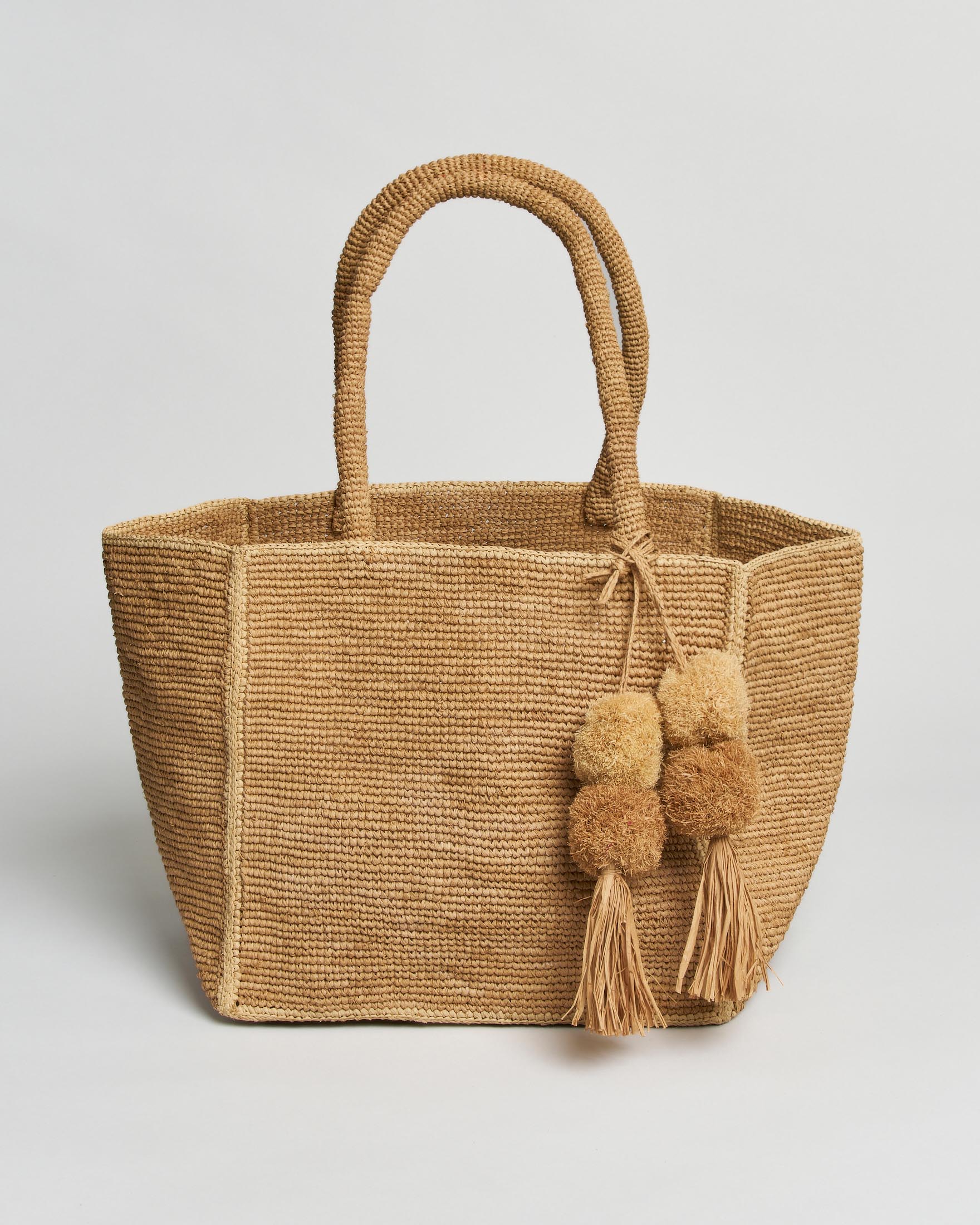 Shopper bag quadrata Sovani in rafia naturale con nappine decorative