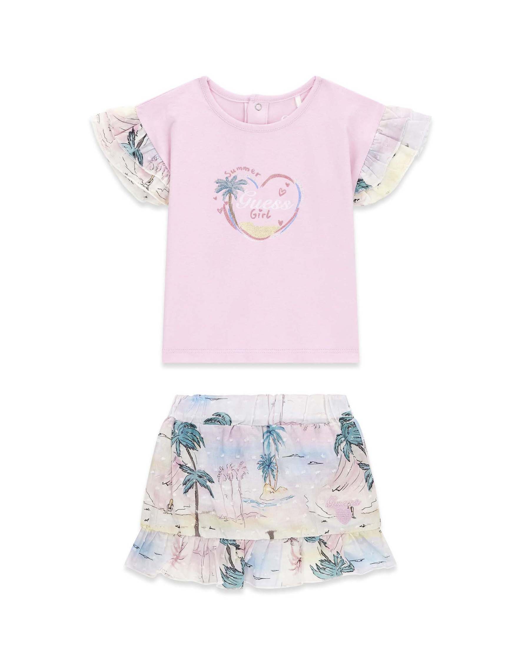 Completo T-shirt e gonna Guess rosa in misto cotone con stampa a palme