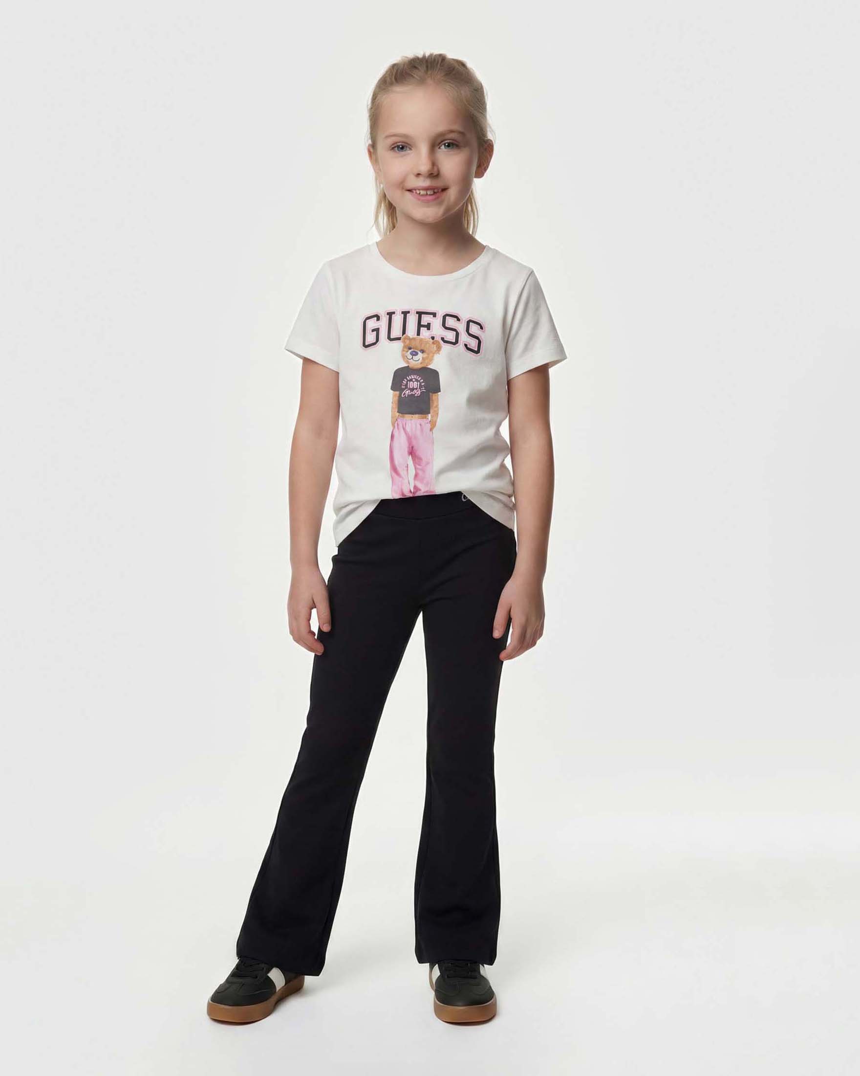 Pantaloni a zampa Guess neri in misto viscosa con logo in strass