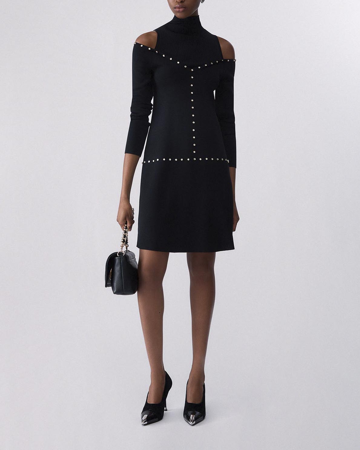Abito corto collo alto Liu Jo nero in maglia di viscosa con cut-out e borchie dorate