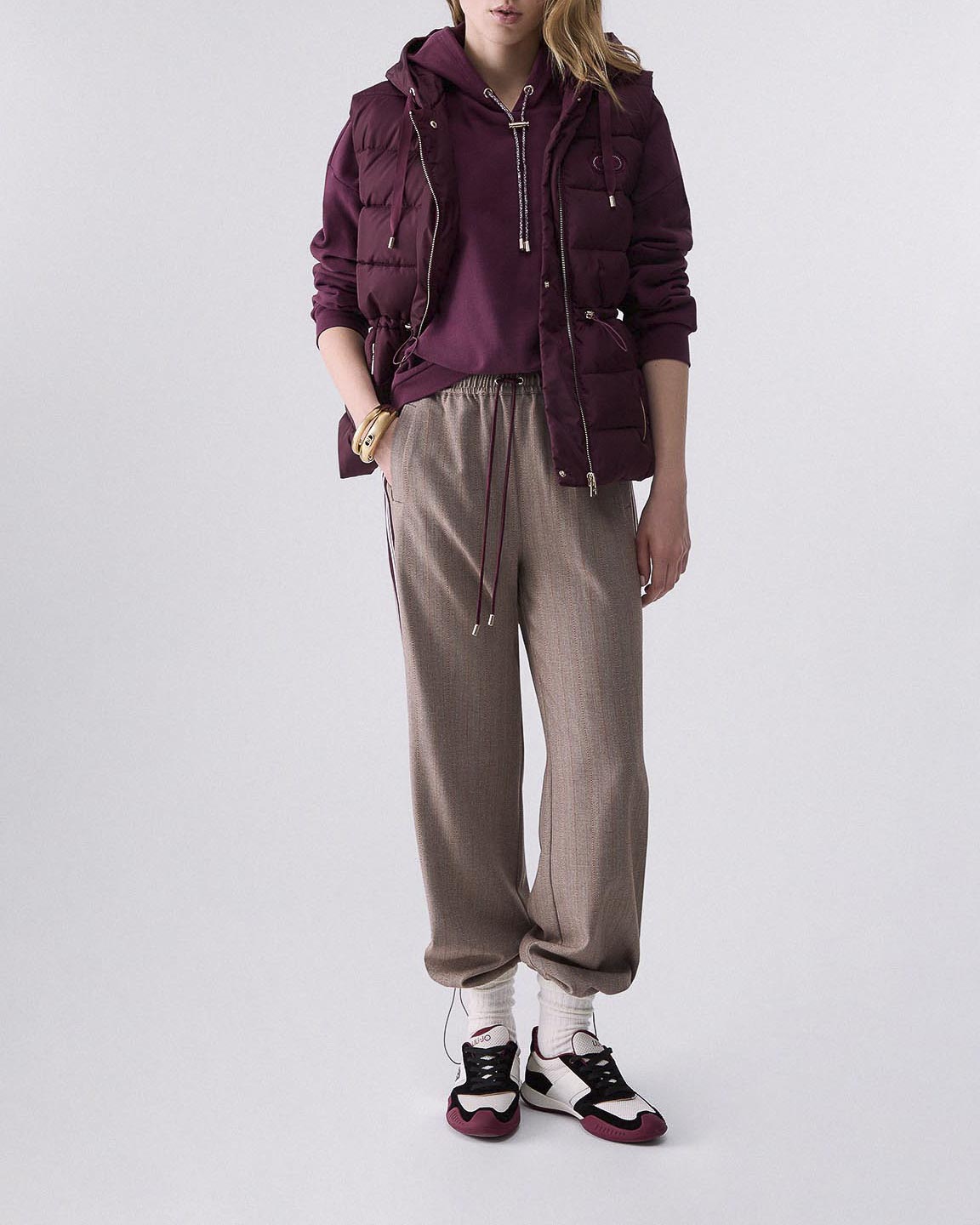 Pantaloni joggers Liu Jo Sport in tessuto spinato marrone e bordeaux con dettaglio righe a contrasto