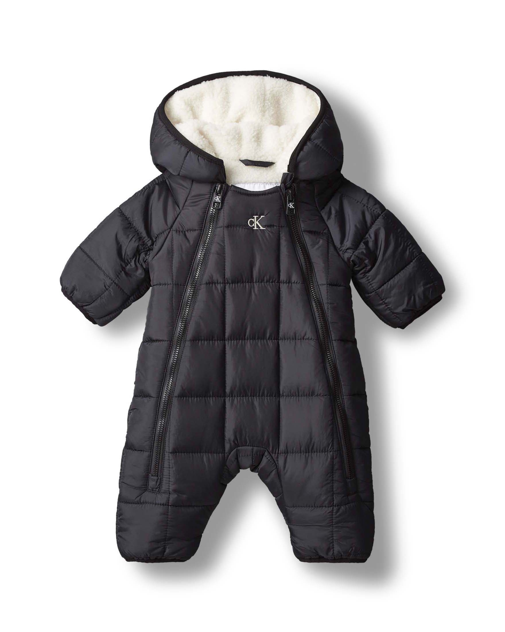 Tuta intera nera Calvin Klein in nylon imbottita con tessuto teddy bianco.