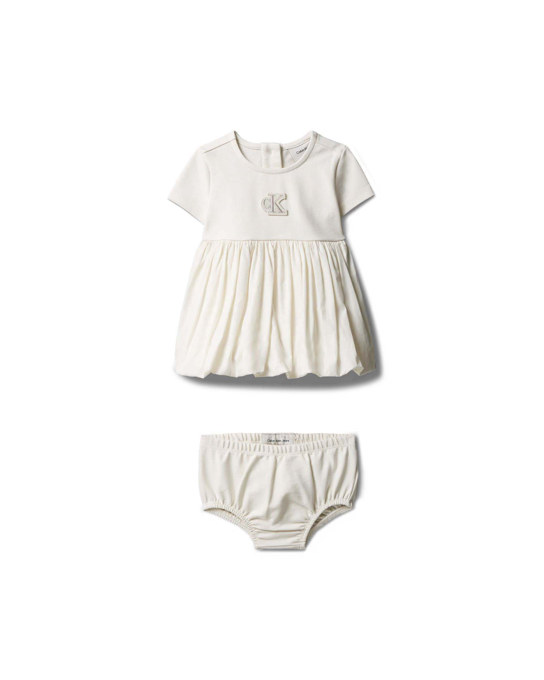 Abito fit and flare color panna Calvin Klein in misto viscosa con culotte abbinata
