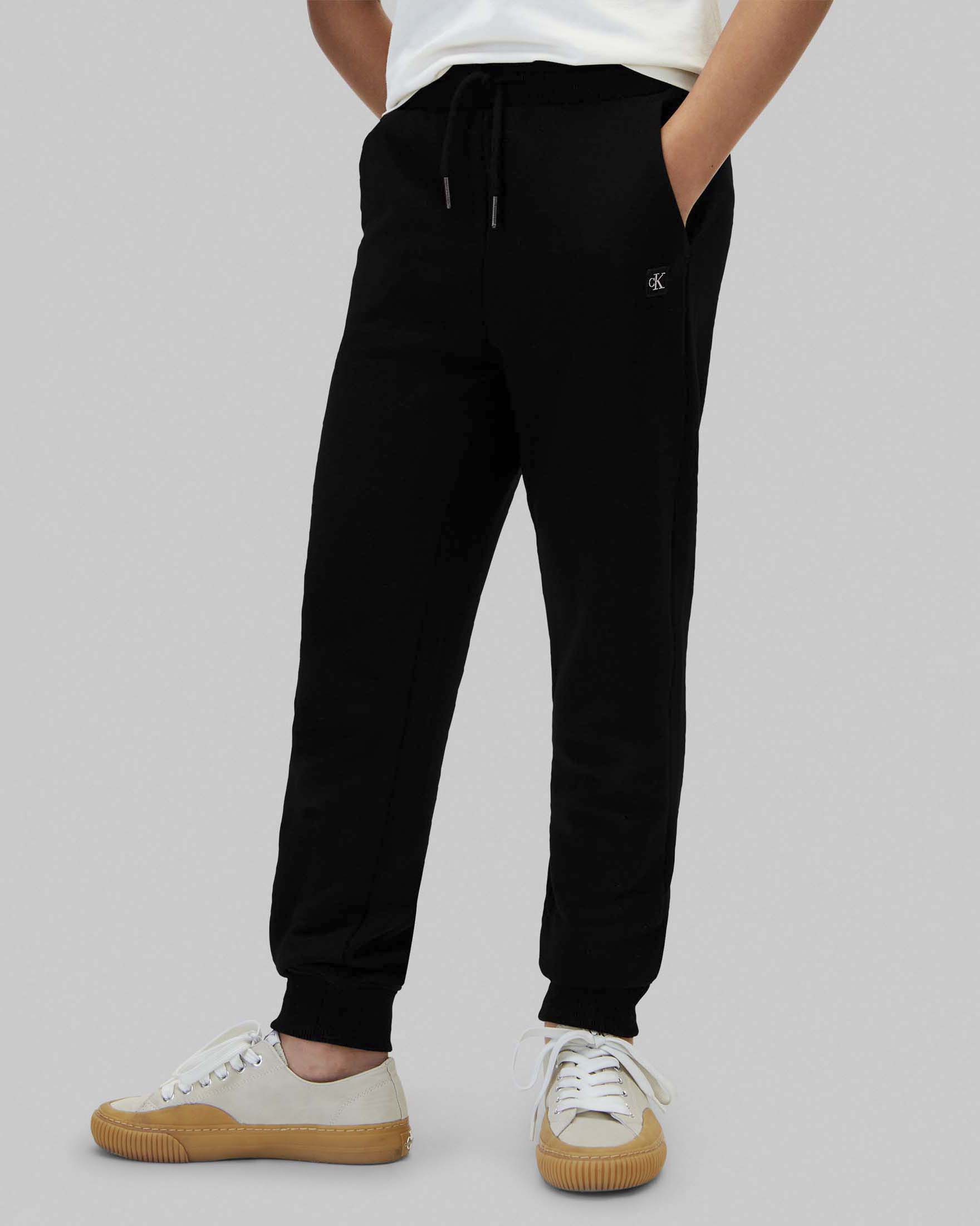 Jogger nero Calvin Klein in felpa di misto cotone con polsini sul fondo