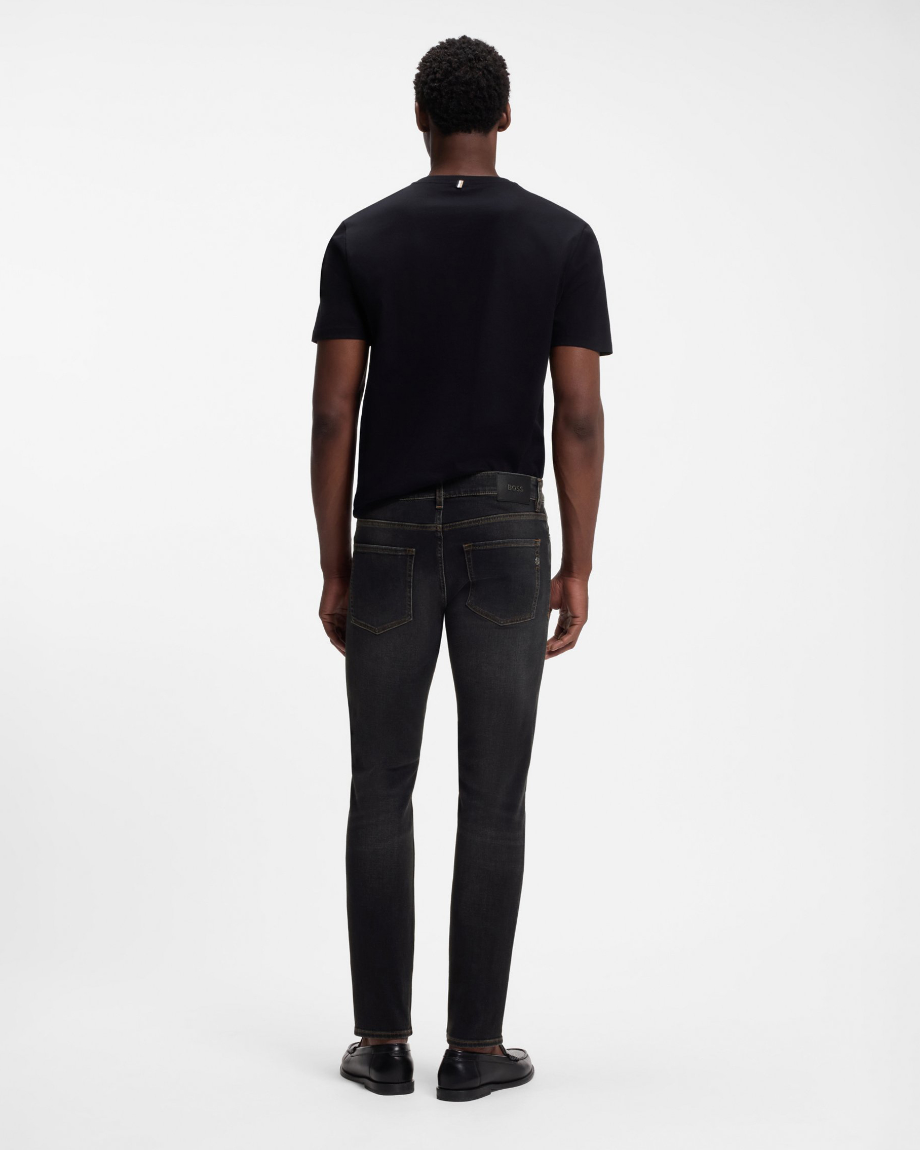 Jeans slim Boss lavaggio nero stone washed in misto cotone elasticizzato image