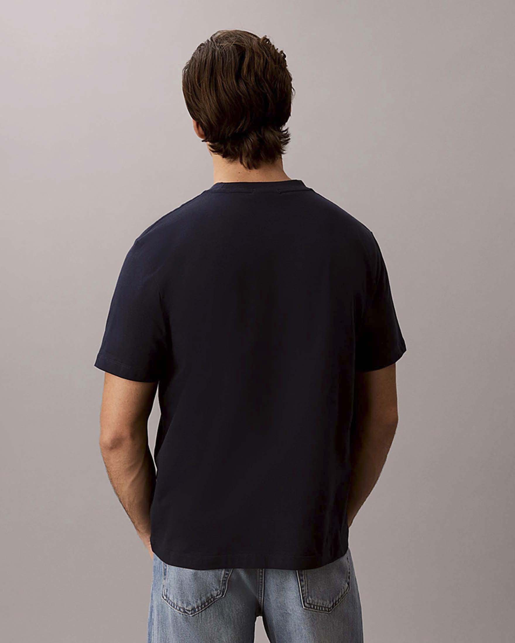T-shirt a maniche corte Calvin Klein Jeans blu in cotone con logo ricamato image