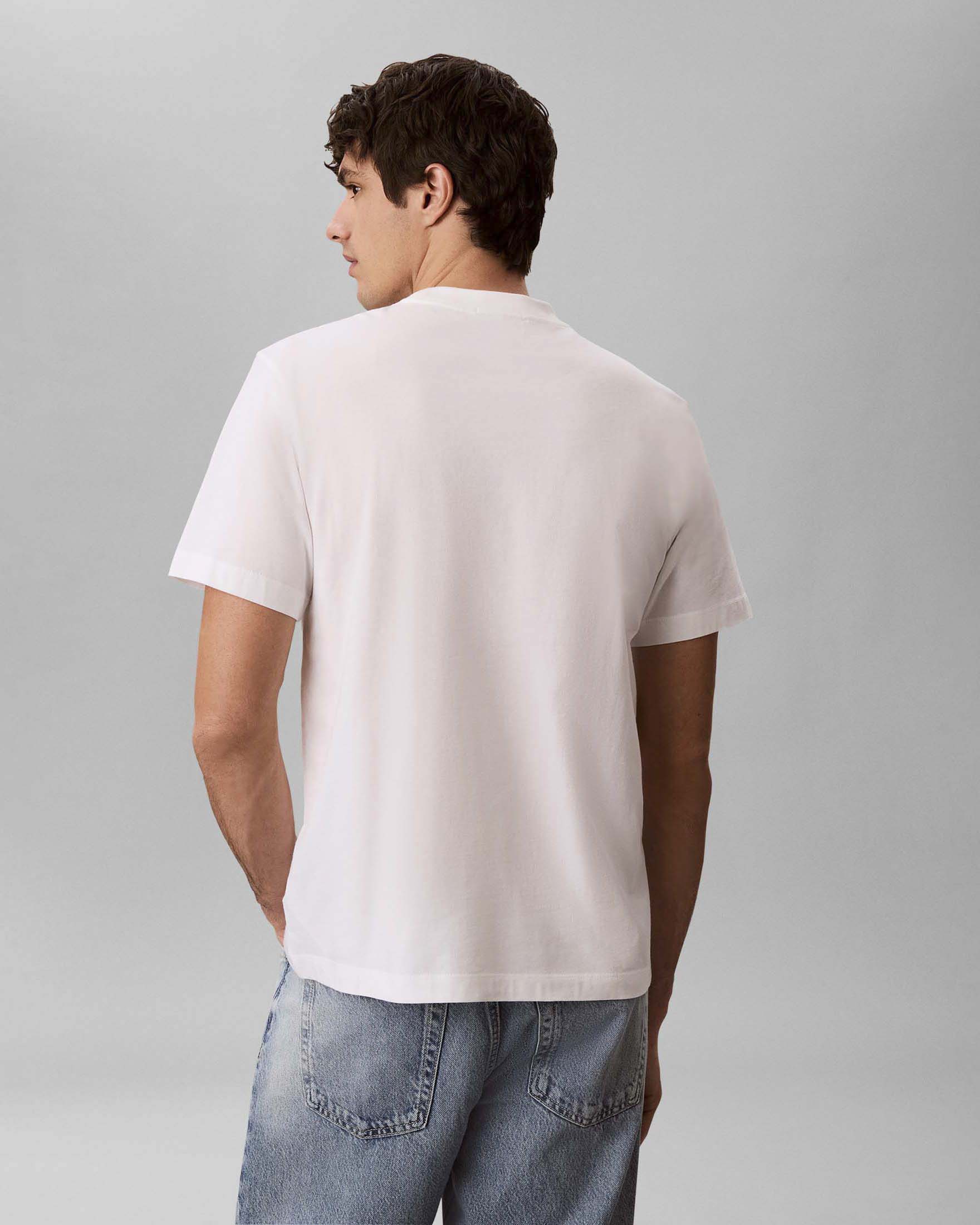 T-shirt mezza manica Calvin Klein Jeans bianca in cotone con logo ricamato image
