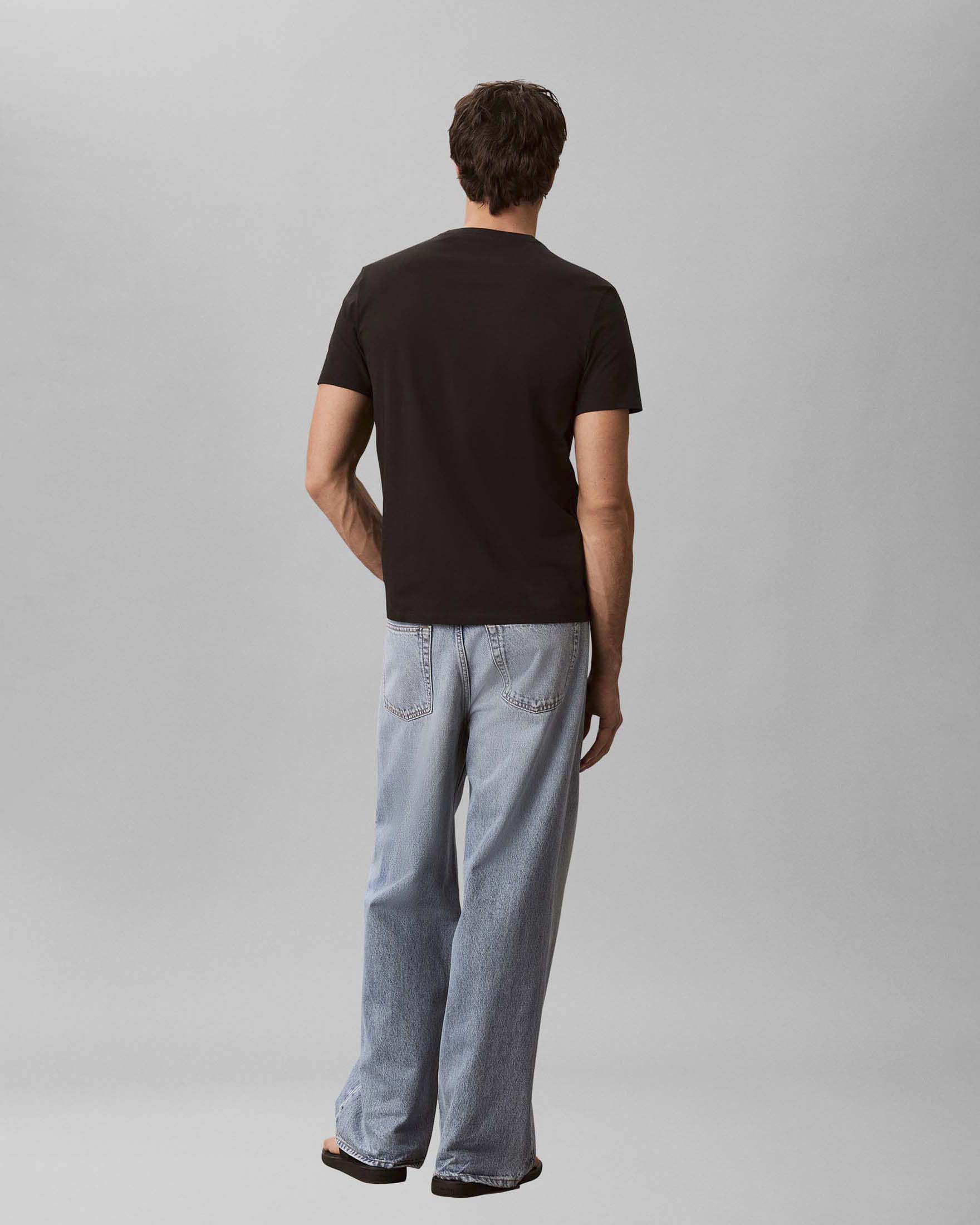 T-shirt mezza manica Calvin Klein Jeans nera in cotone con logo stampato image