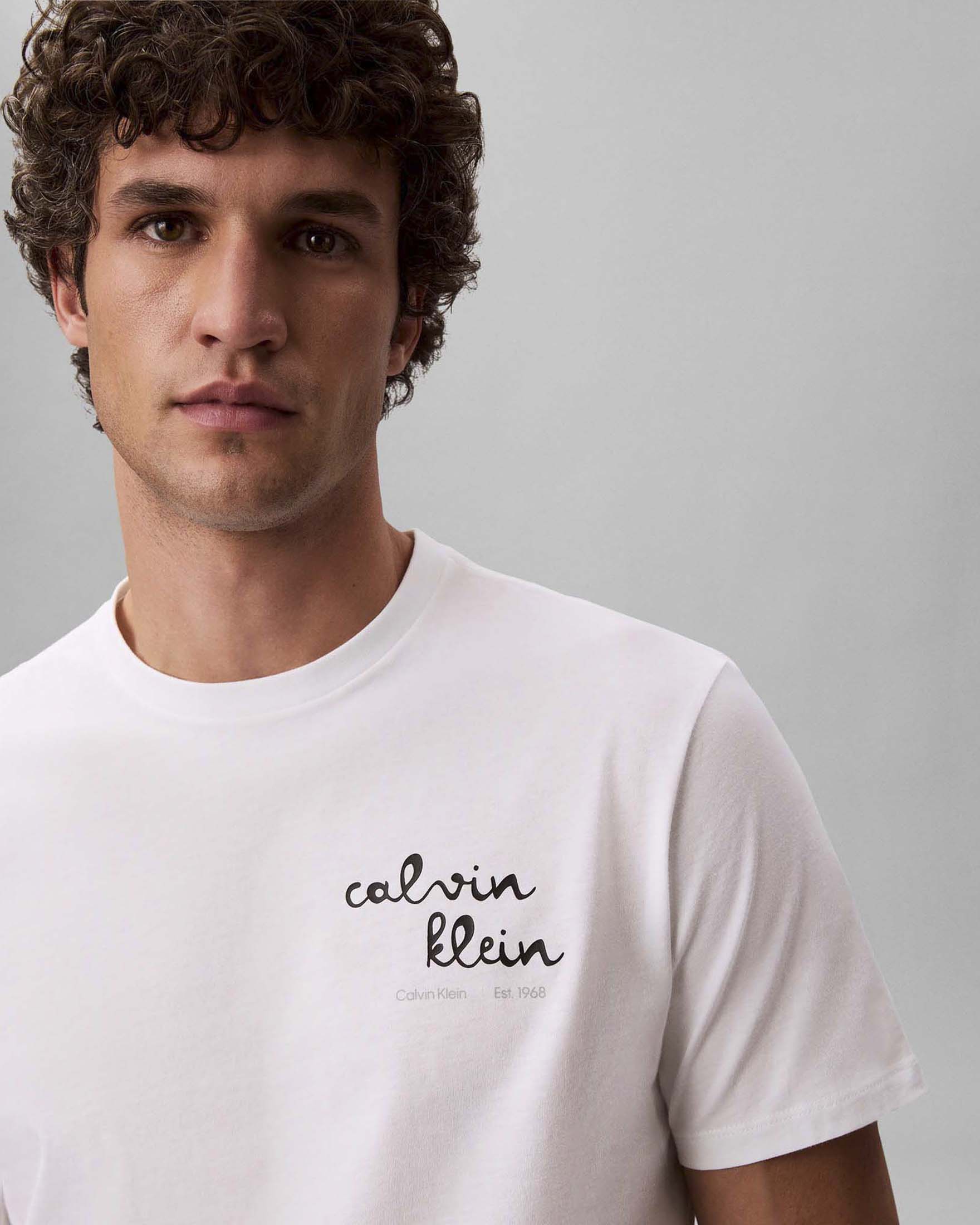 T-shirt Calvin Klein Jeans bianca in cotone con logo stampato image