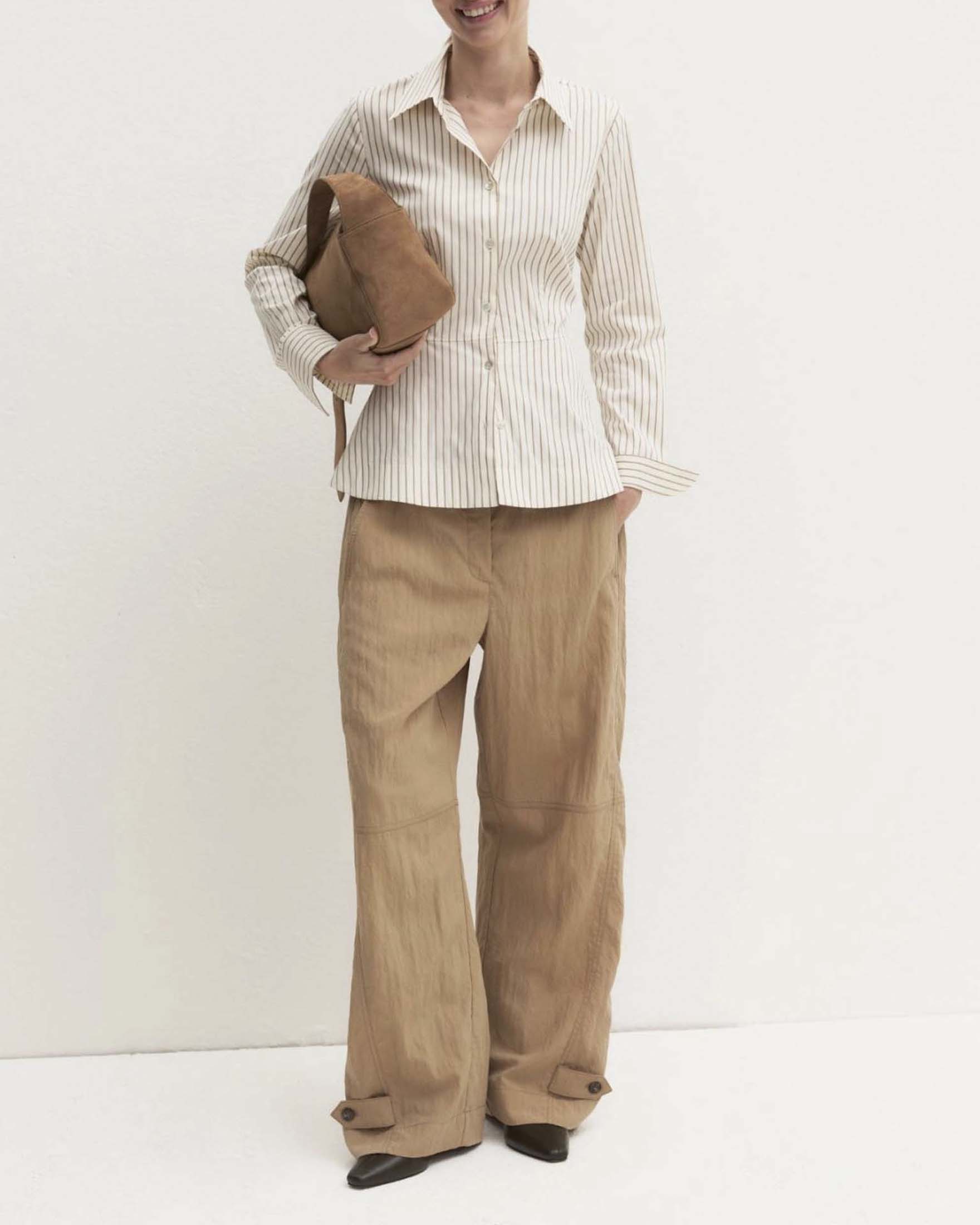 Camicia peplum Emme Marella bianca in popeline di cotone stretch a righe beige con taglio in vita image