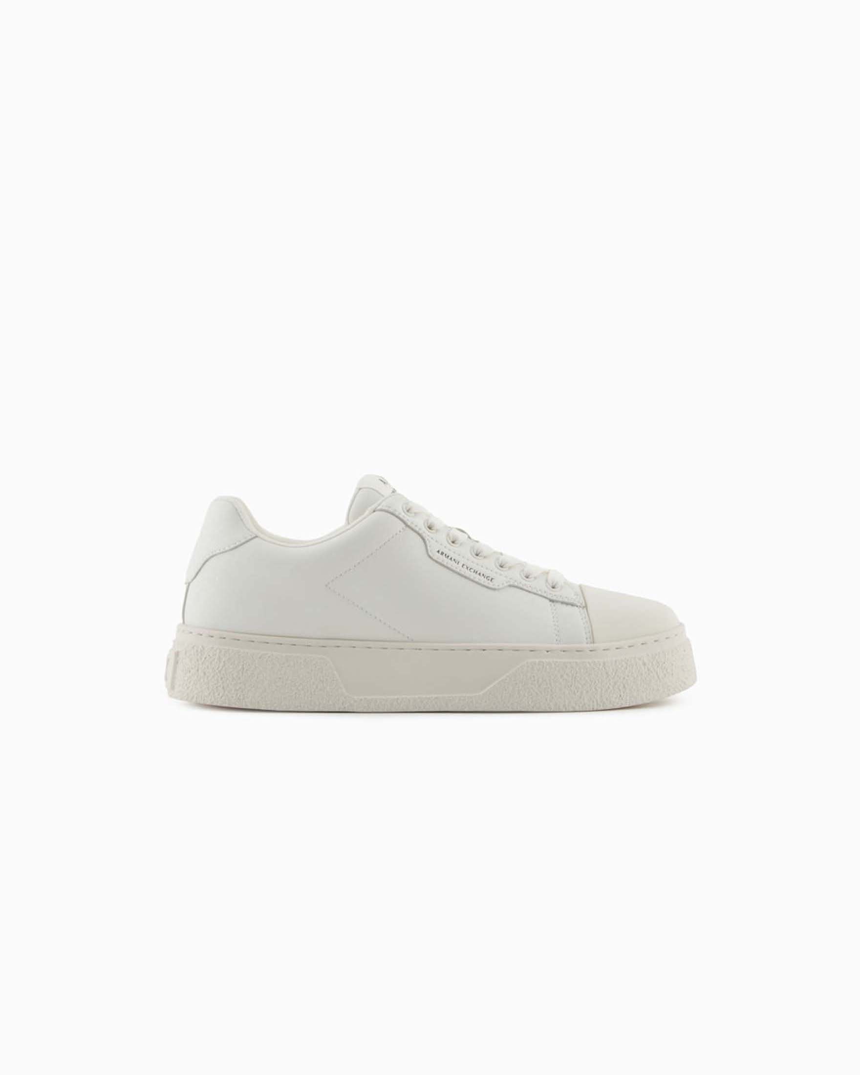 Sneakers Armani Exchange panna in pelle con suola alta e logo in rilievo