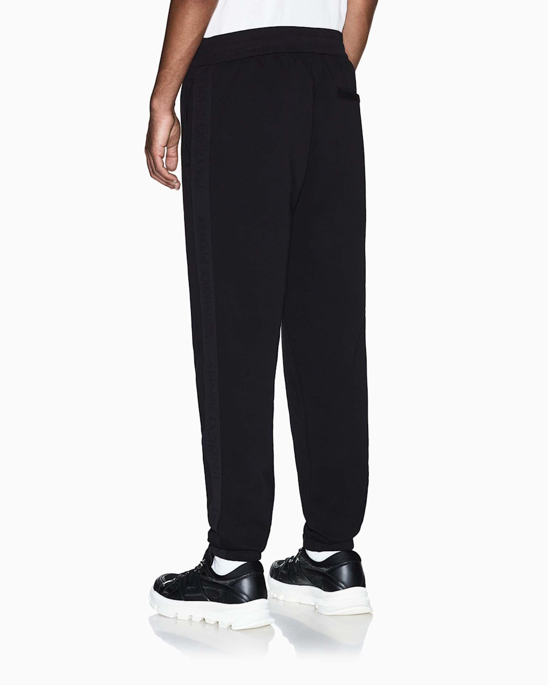 Pantaloni jogger Armani Exchange neri in misto cotone con bande image