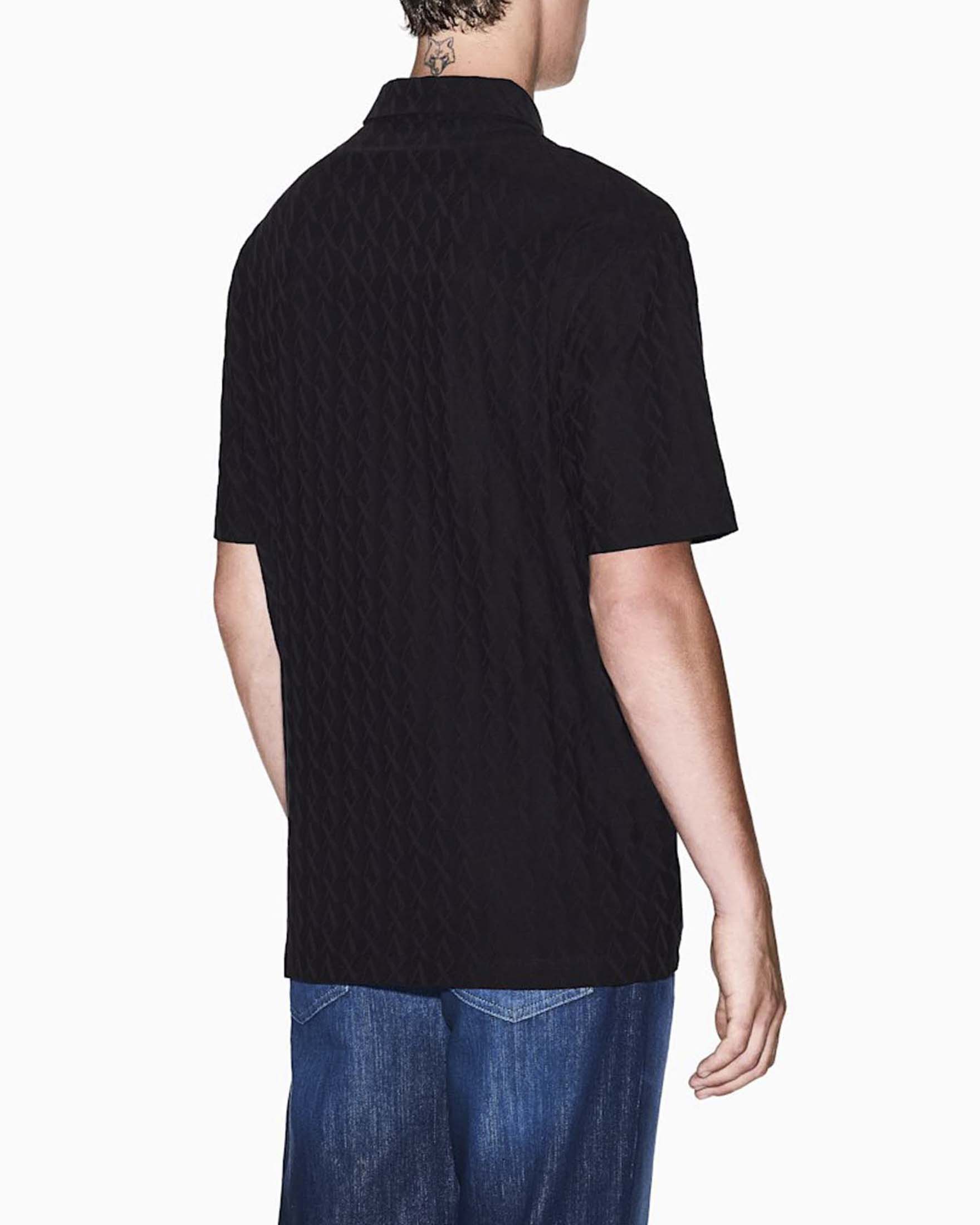 Polo Armani Exchange nera in cotone con lavorazione jacquard image