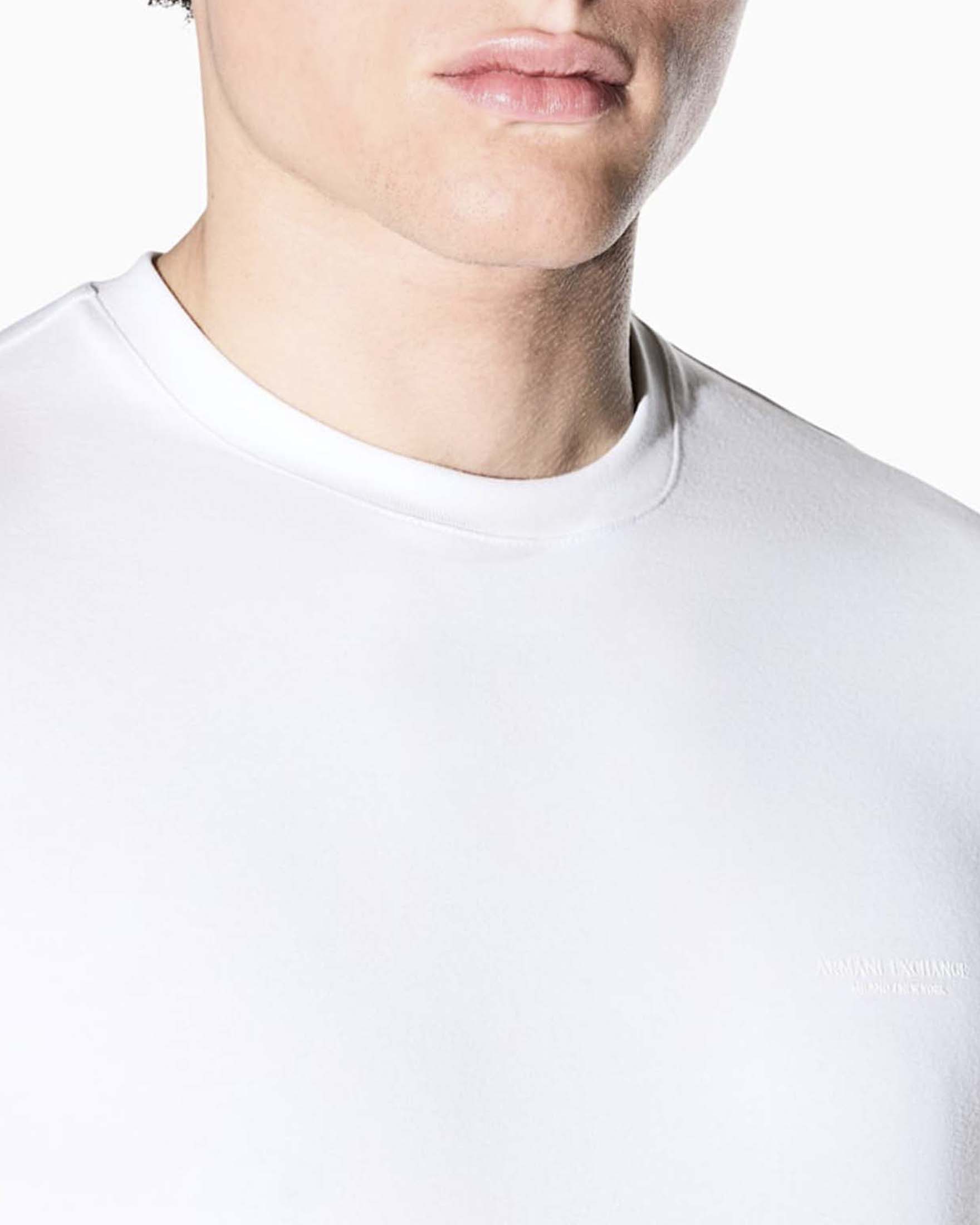 T-shirt mezza manica Armani Exchange bianca in cotone elasticizzato con logo piccolo image