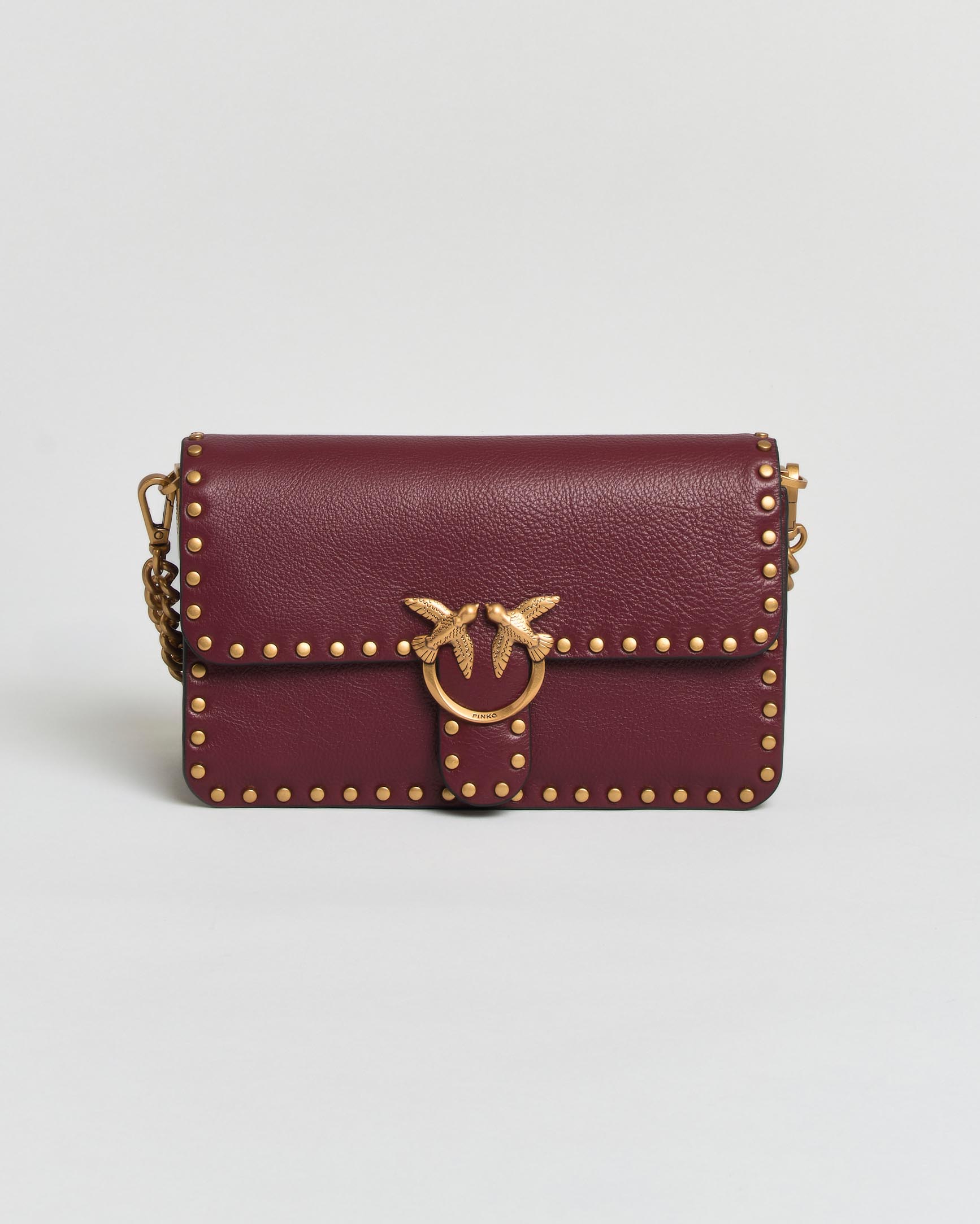 Borsa a tracolla Baby Love Bag One Slouchy Pinko bordeaux in pelle con borchie e logo dorati
