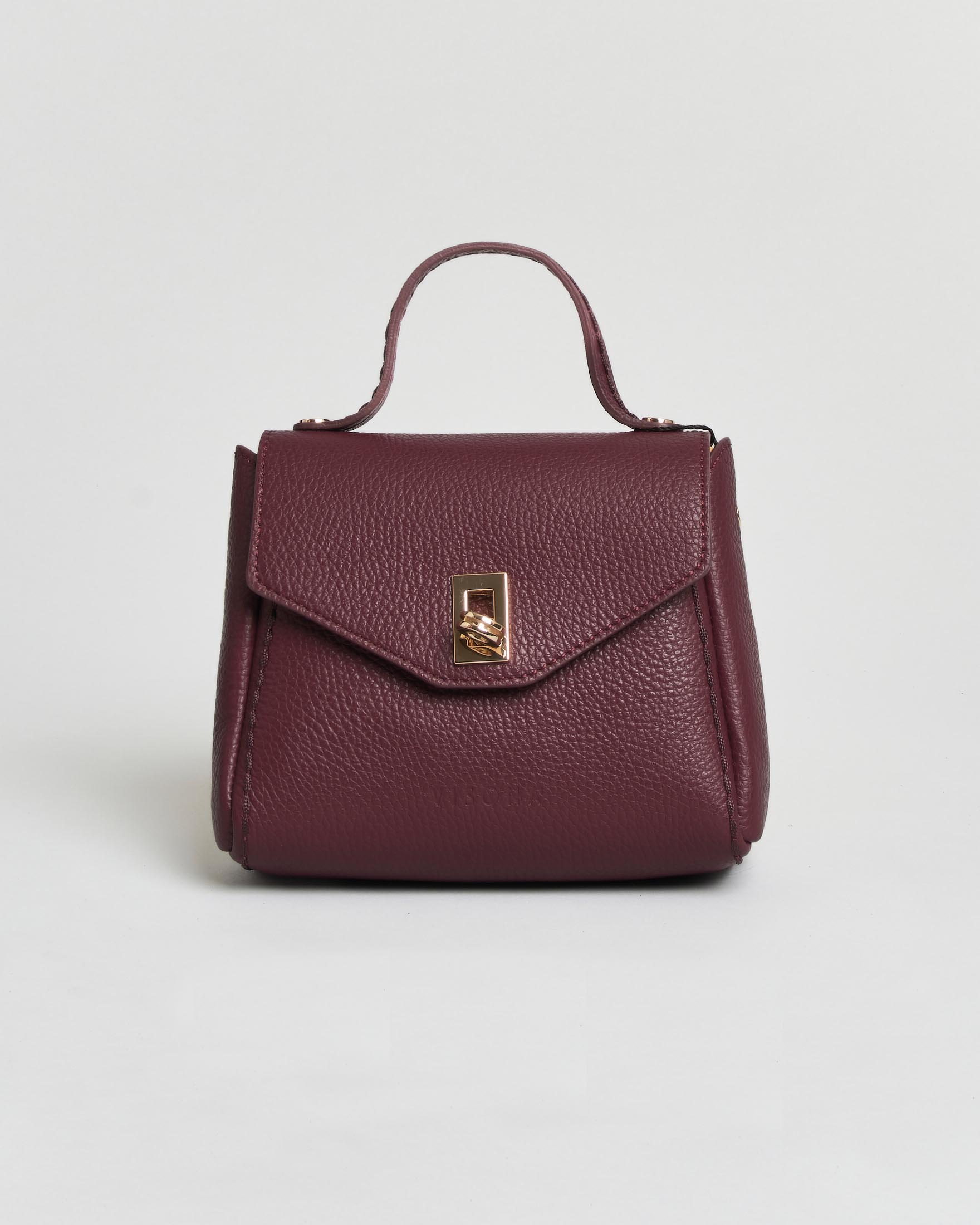 Mini bag Visonà bordeaux in pelle martellata con impunture e patta con chiusura a girello