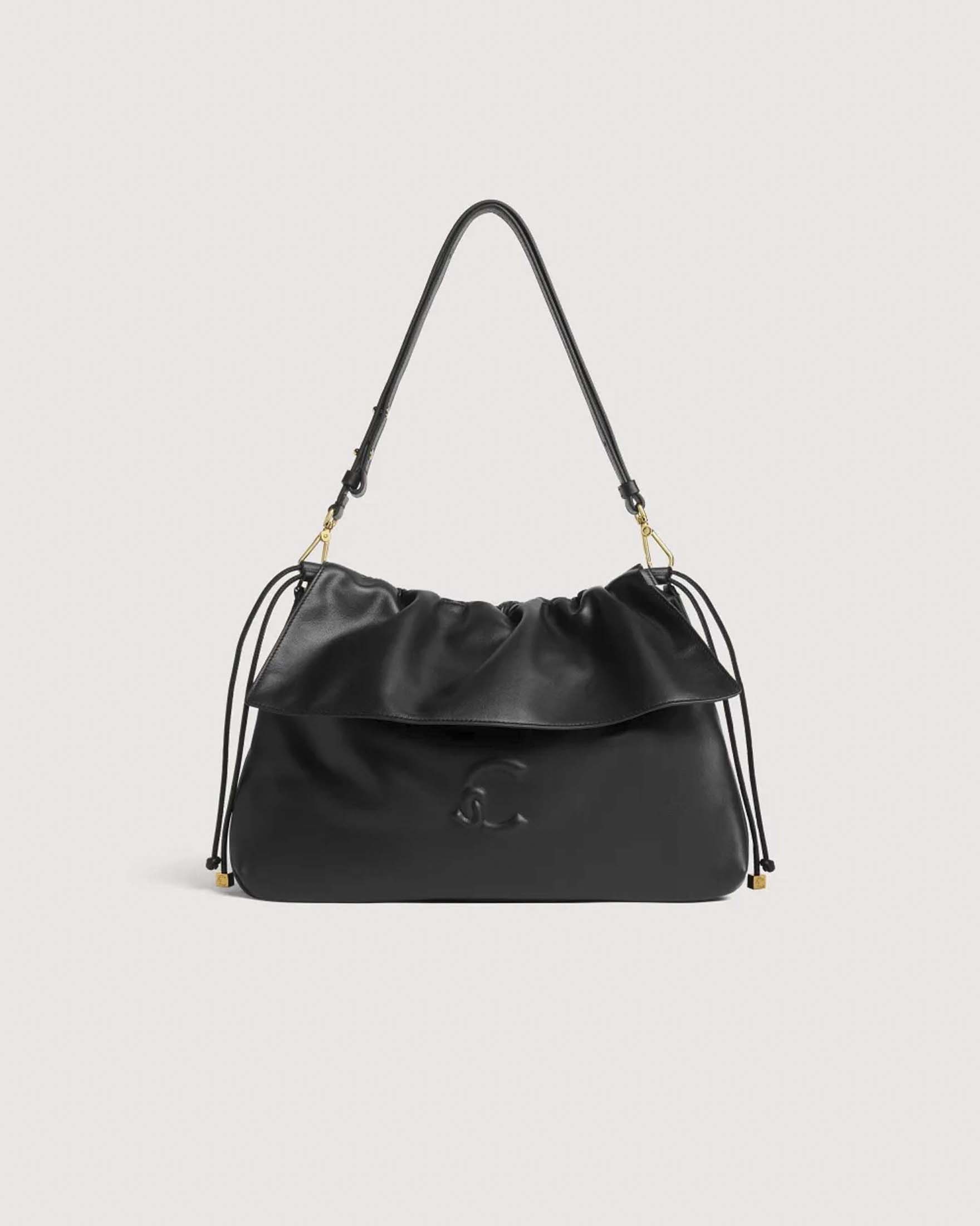 Borsa a spalla a sacchetto Lidia Medium Coccinelle nera in pelle liscia con logo C-Me