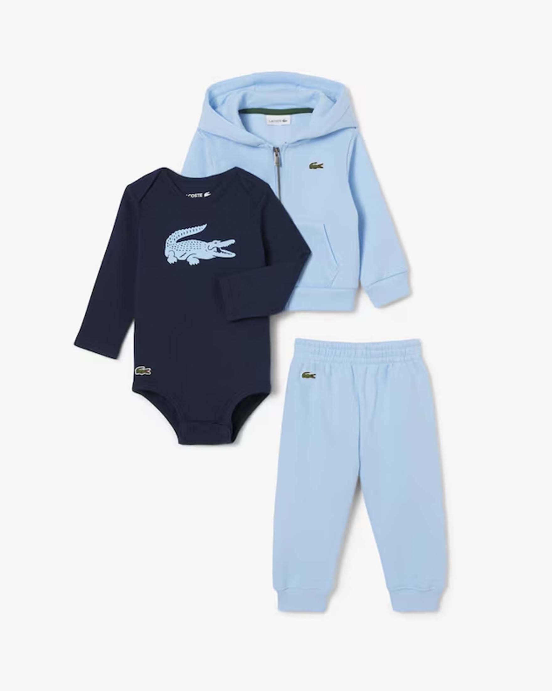 Completo tuta Lacoste azzurro in cotone stretch con body