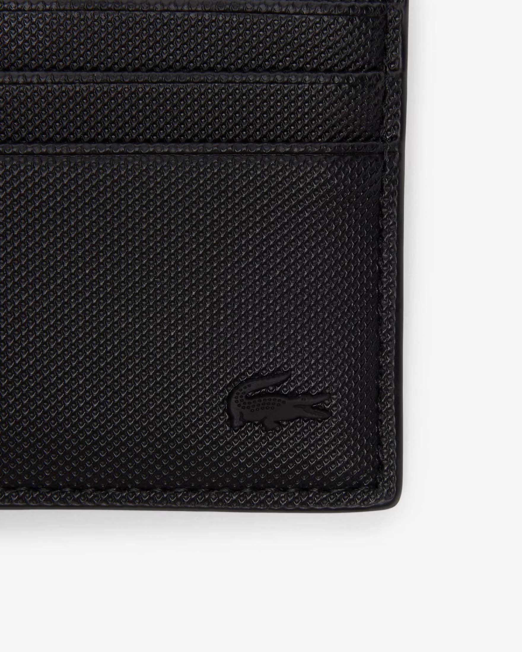 Portacarte Lacoste nero in similpelle effetto piqué image