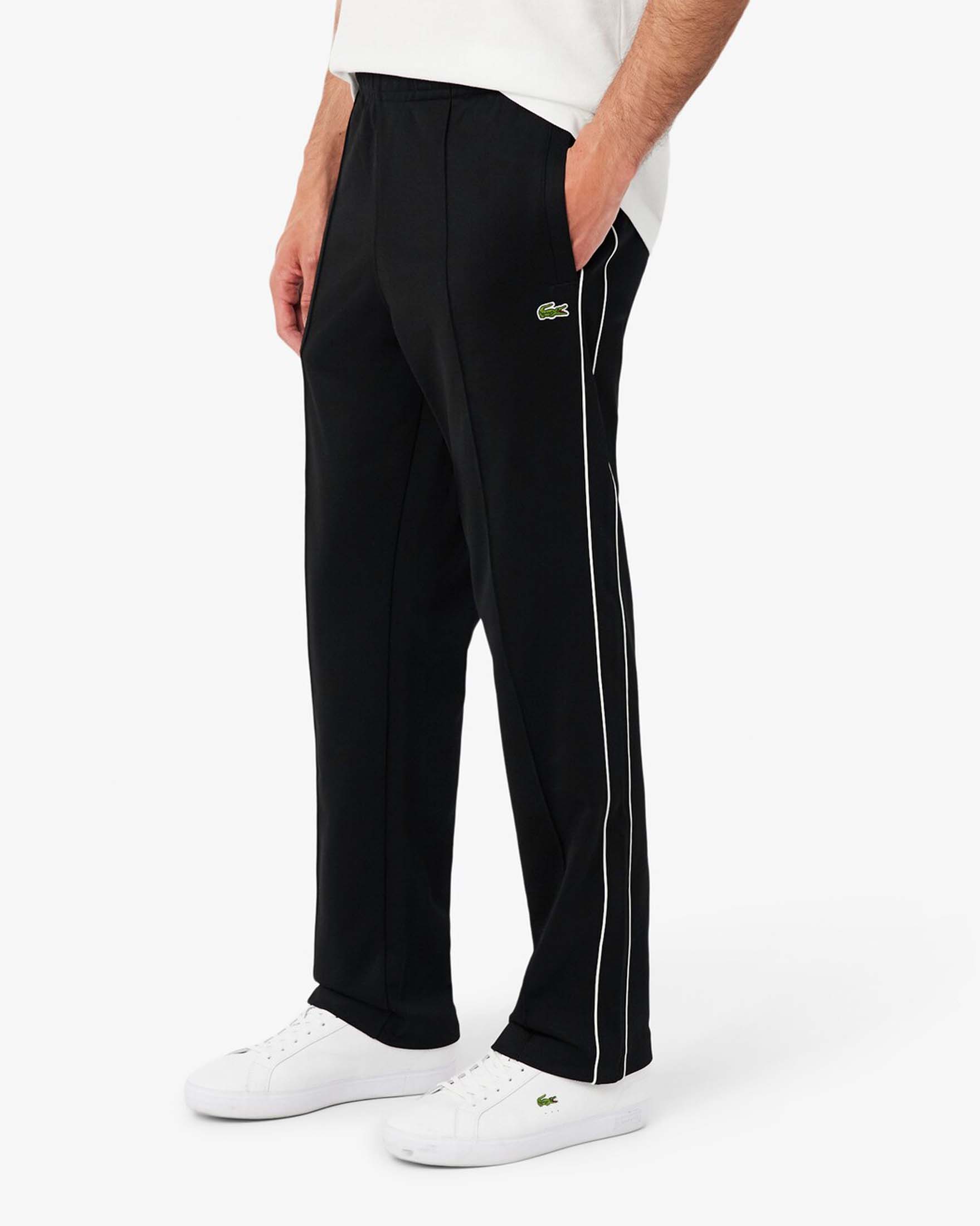 Pantaloni felpa Lacoste neri in piqué interlock di cotone image