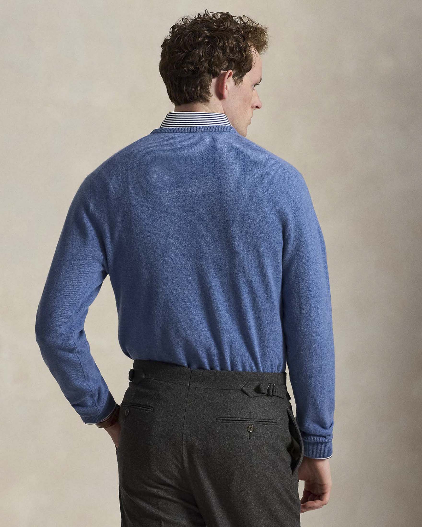 Maglia Polo Ralph Lauren celeste in pura lana con scollo a giro e logo pony ricamato sul petto image