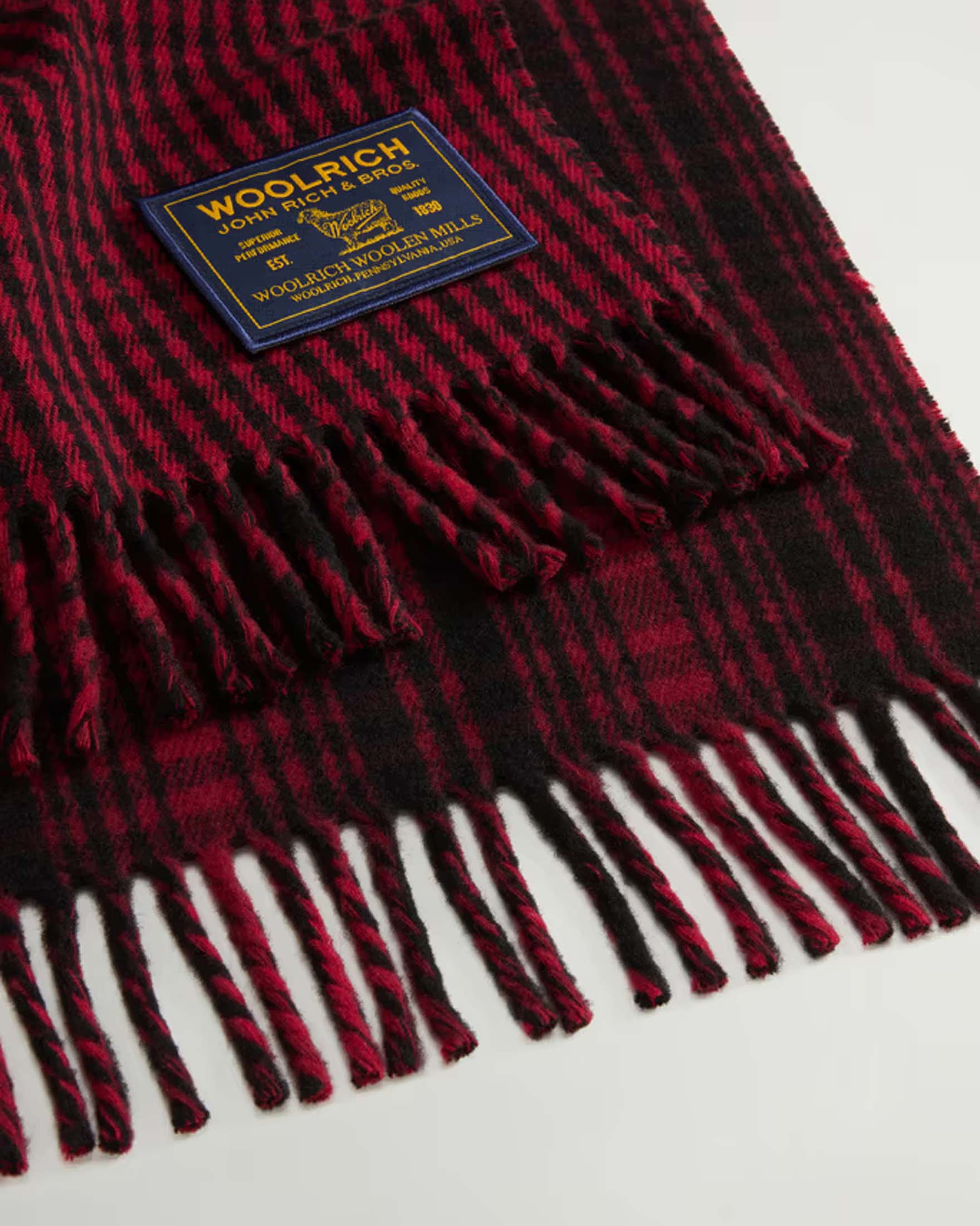Cappa Woolrich rossa in pura lana a motivo tartan nero con frange image