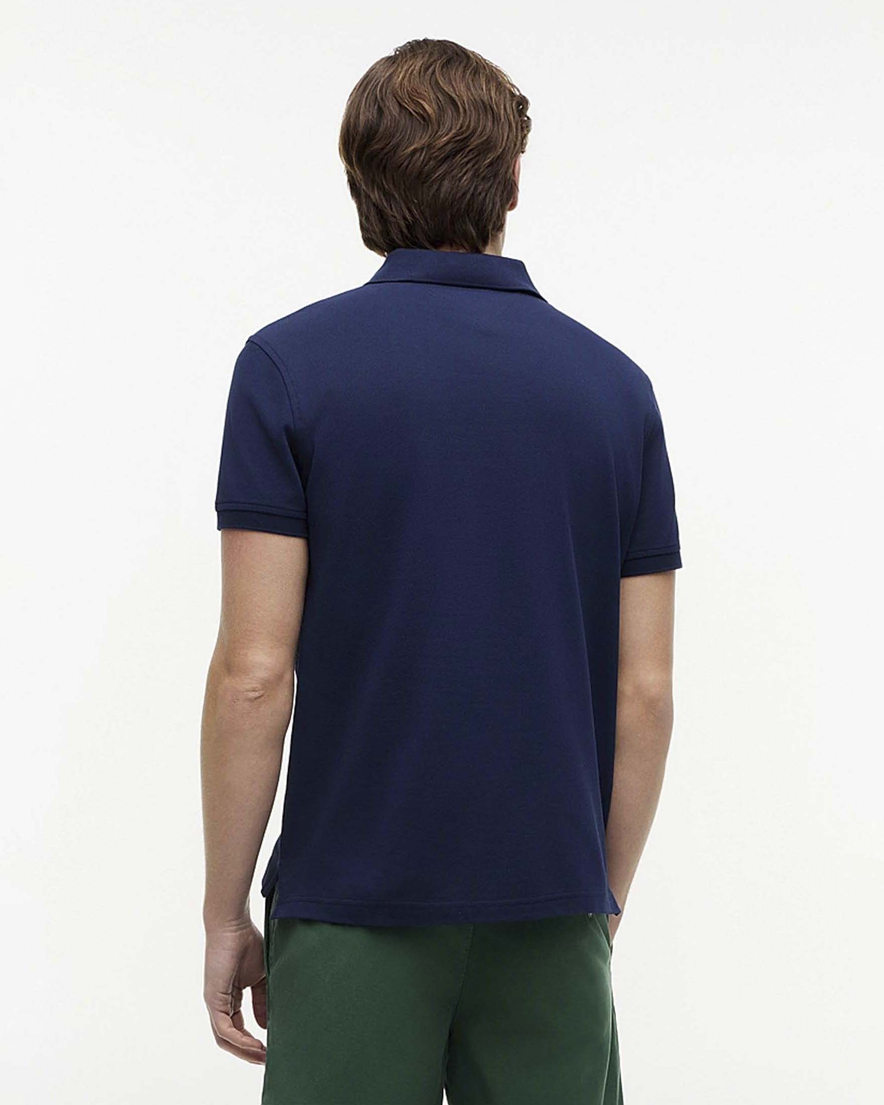 Polo mezza manica Tommy Hilfiger blu in cotone stretch con logo flag ricamato sul petto image