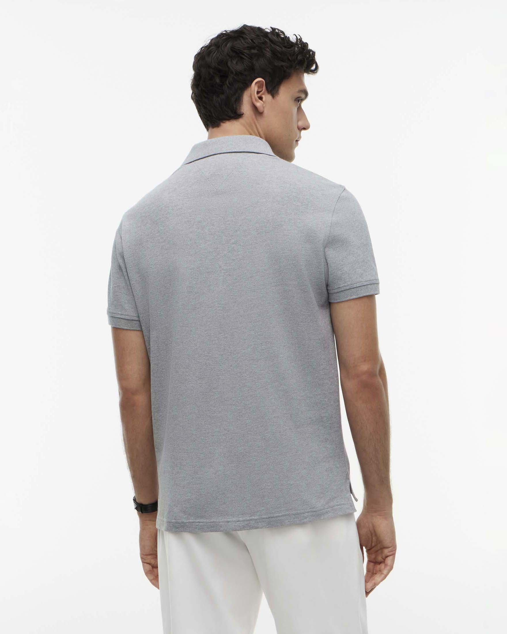 Polo mezza manica Tommy Hilfiger grigia in cotone stretch con logo flag ricamato sul petto image