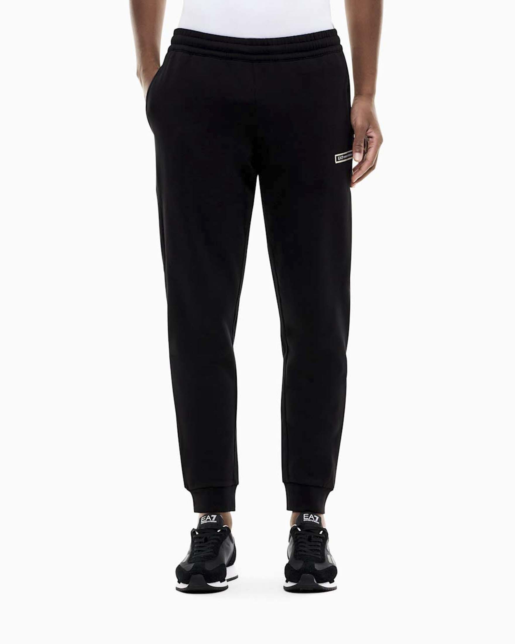 Pantaloni EA7 neri Logo Series slim fit con bande laterali