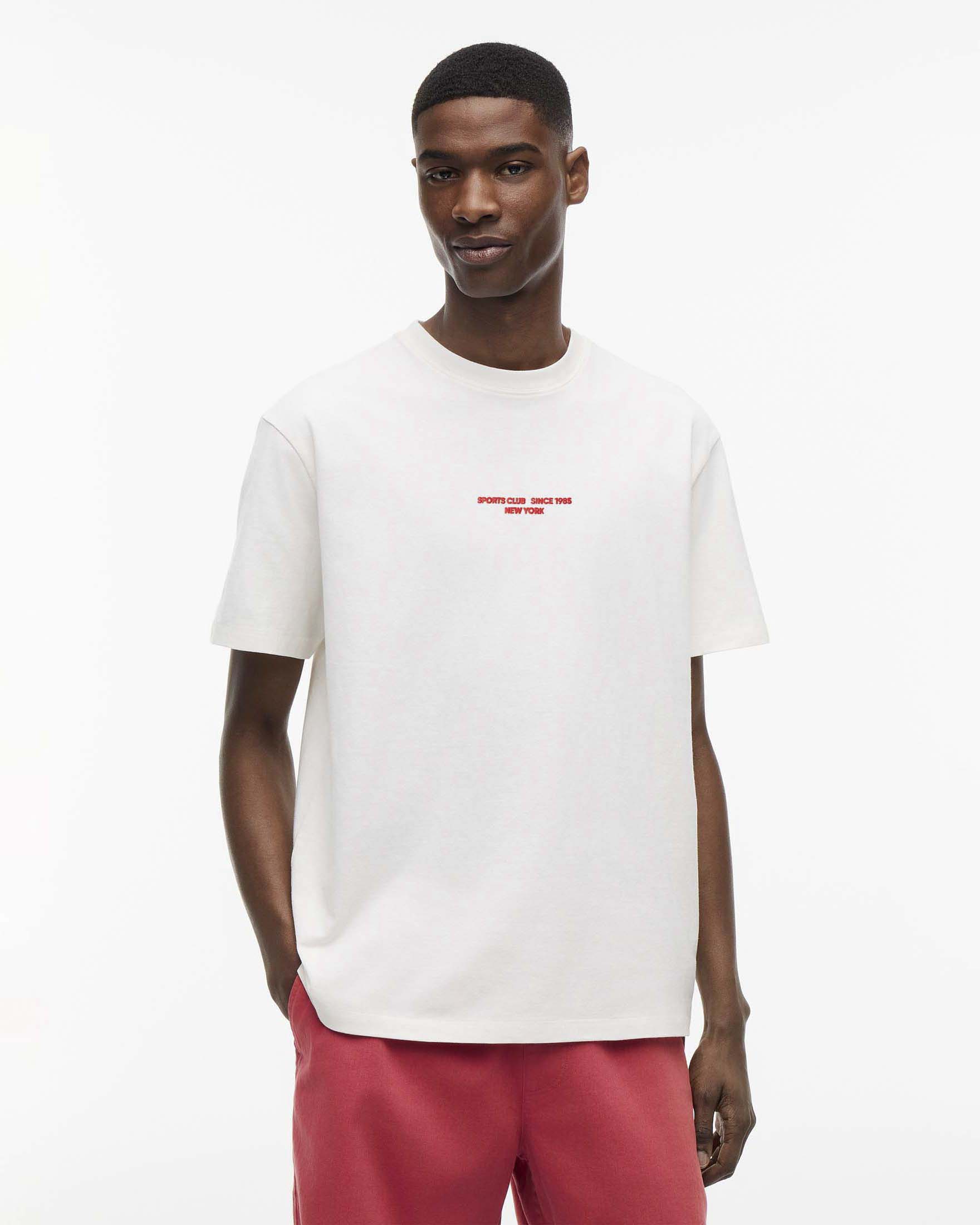 T-shirt Tommy Jeans bianca relaxed fit in cotone con grafica sul retro