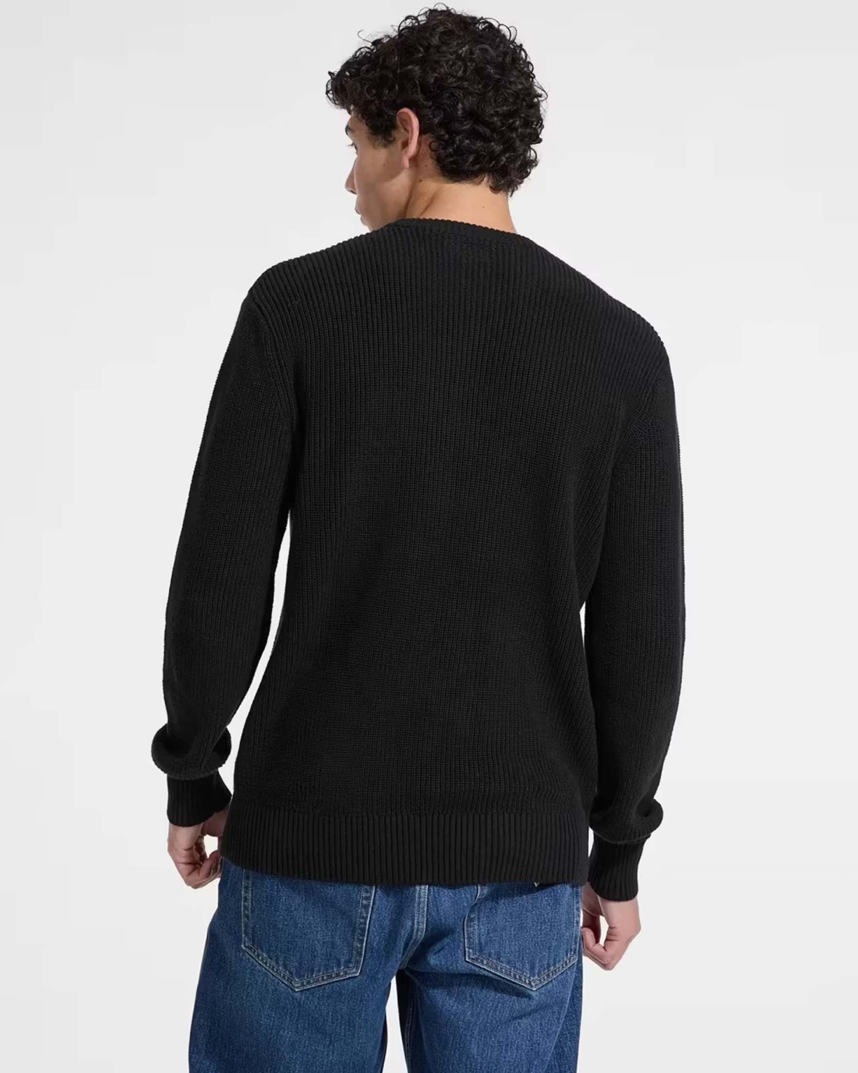 Maglione girocollo Guess Jeans nero in cotone a coste con patch logo triangolo applicata image