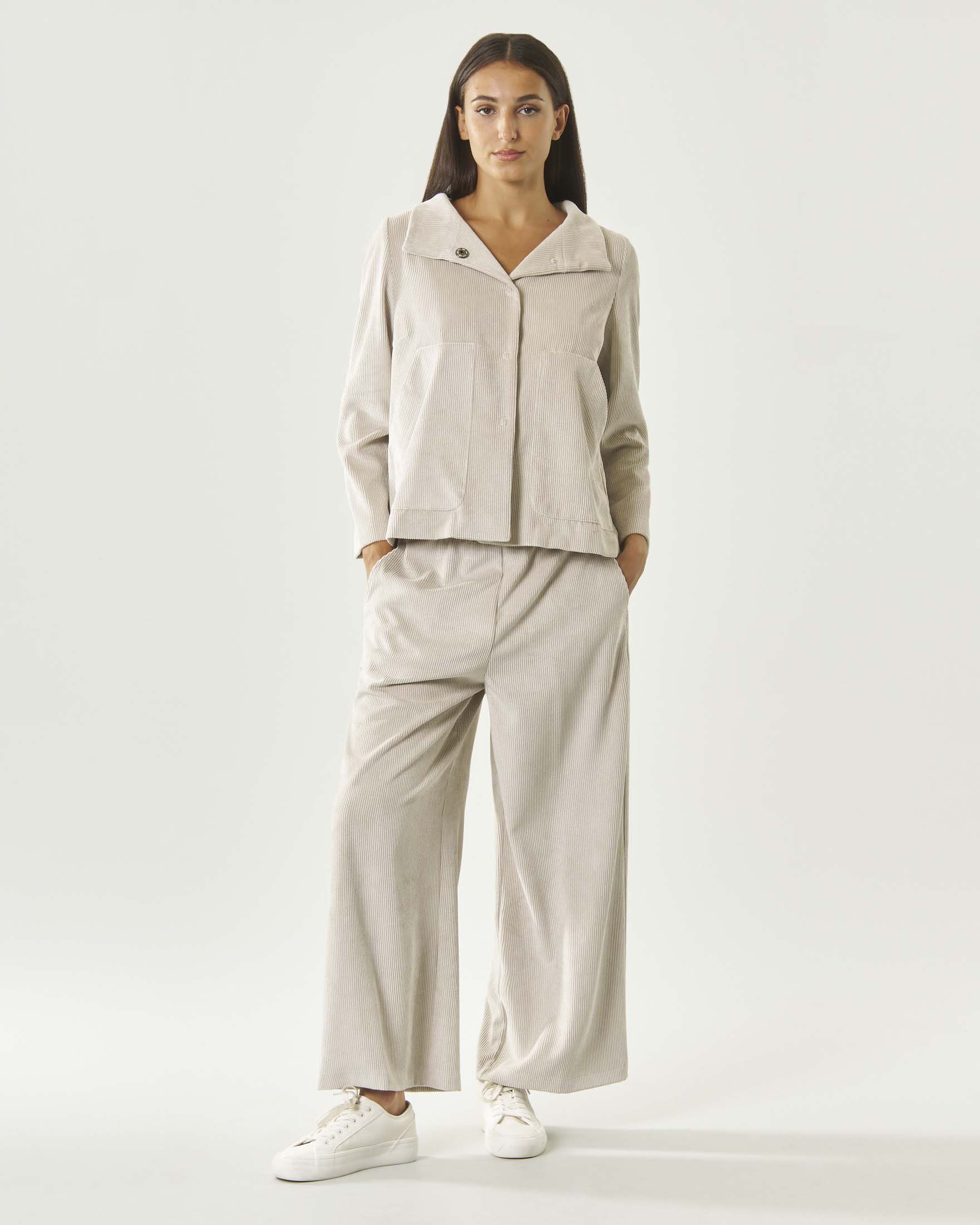 Pantaloni wide leg Jurerê color panna in velluto a coste con vita elasticizzata e tasche alla francese