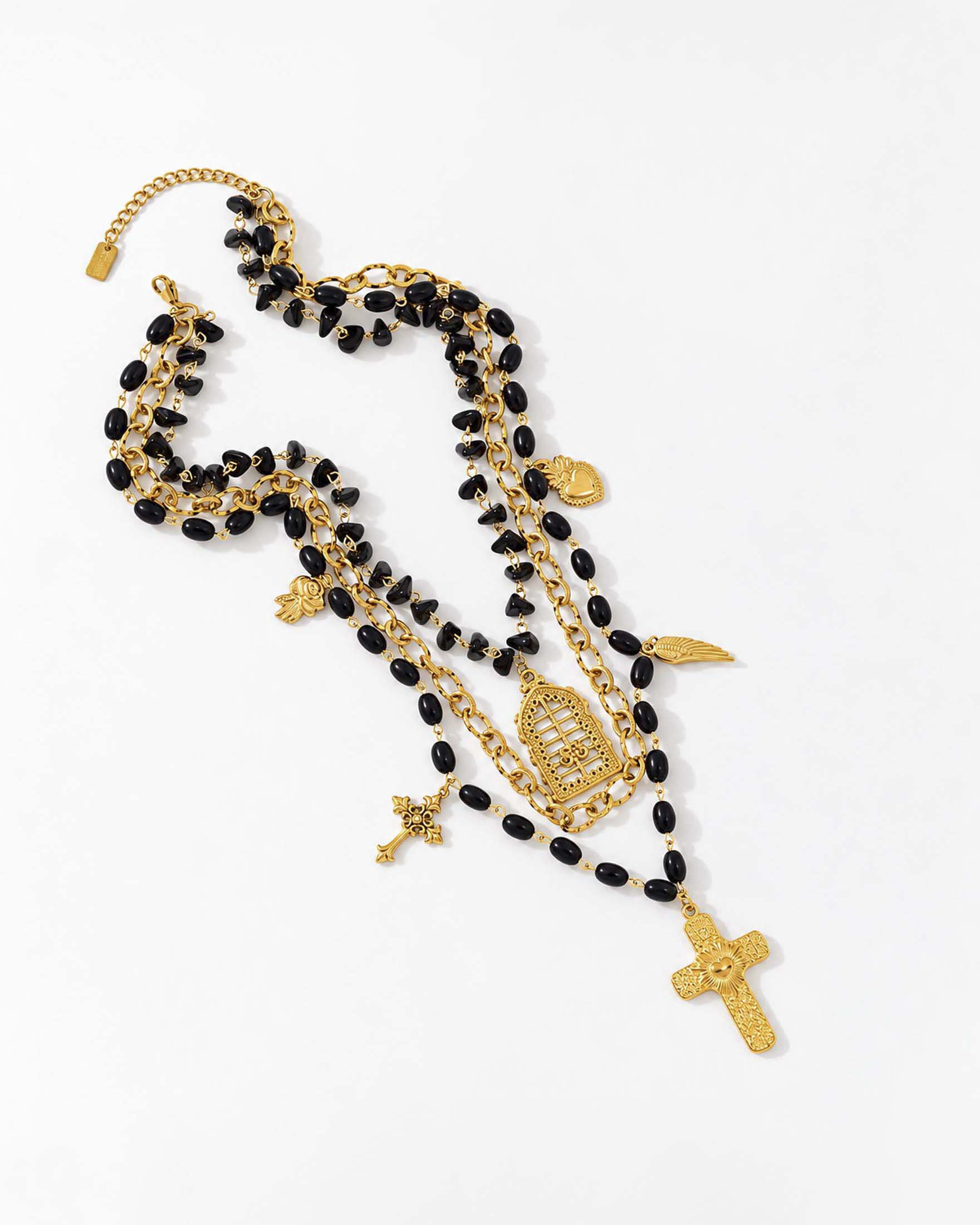 Collana lunga multifilo Somini con perline nere e pendenti dorati